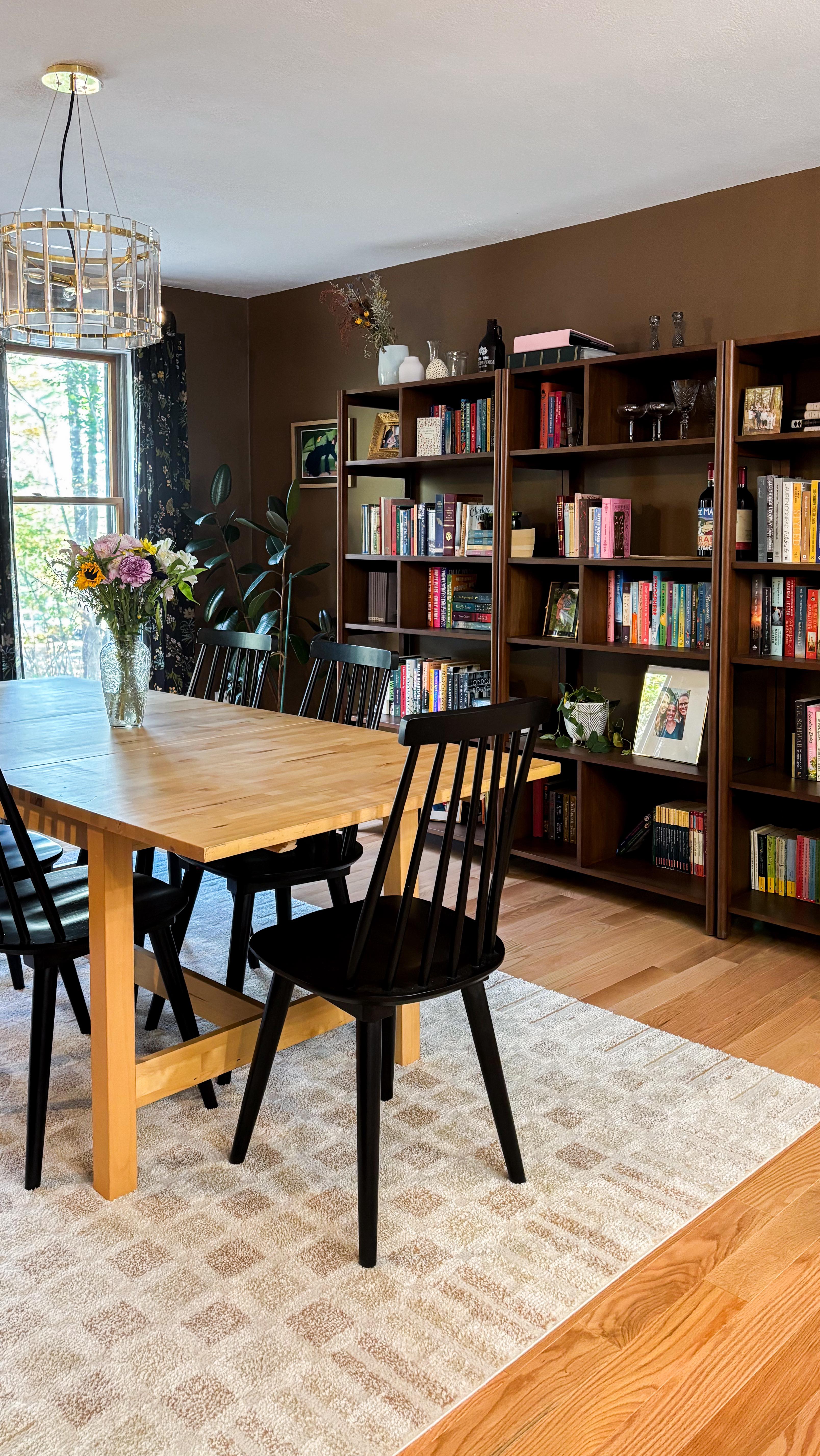 Is it safe to say this dining room is finished? I think so!
I scored the most beautiful chandelier at my local @crateandbarrel outlet and it’s like it was meant to me. That and the rug really make a difference.
Have I inspired you to try brown paint yet? ☺️ Wall color is “grounded” by @sherwinwilliams
#diningroomdesign #diningroominspo #interiordesignersofinsta #interiordesigntips #homelibrary #midcenturystyling #ourarticle