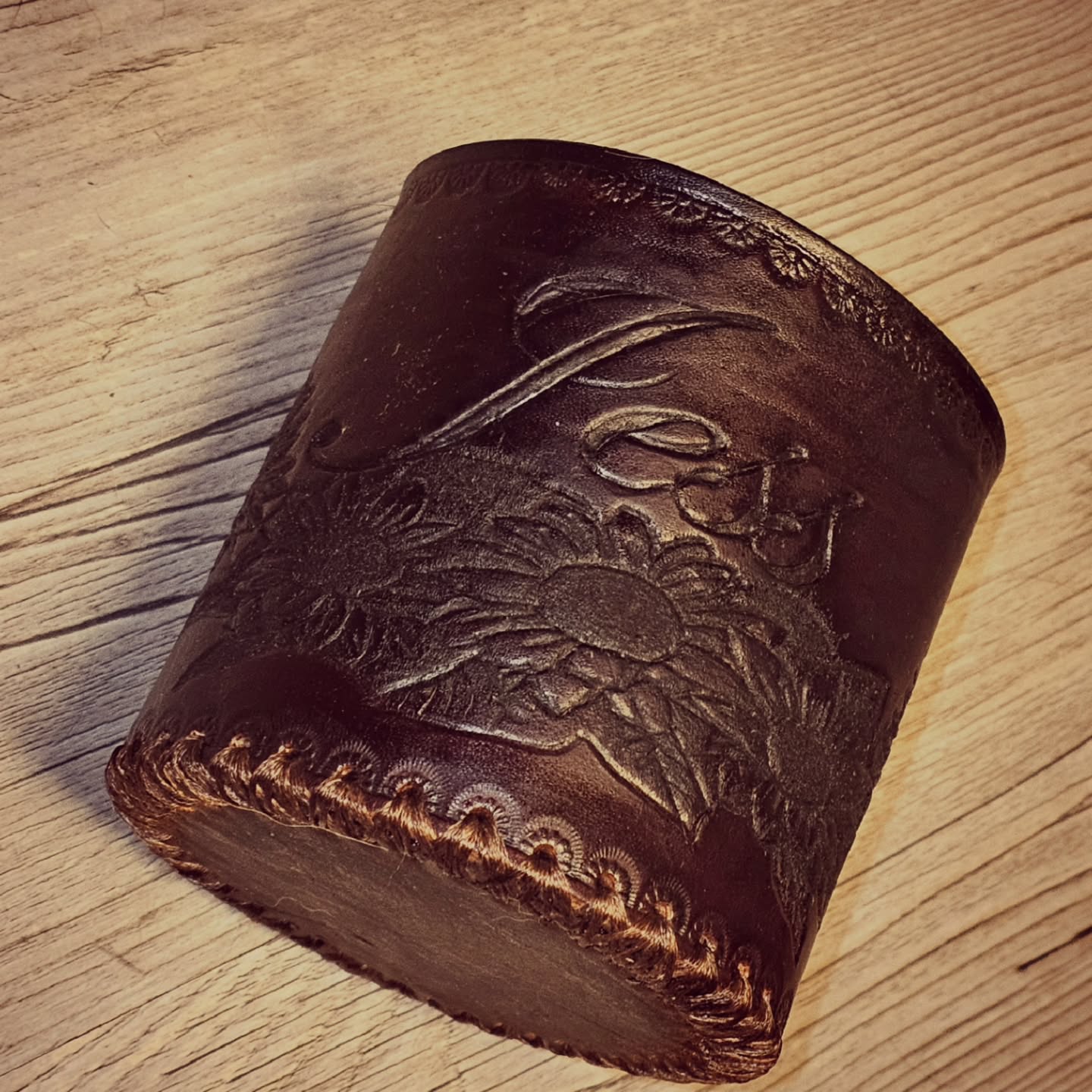 Custom bar dice cup for local bartender. She requested dark color, name, and sunflowers but gave me creative control...love creative control! #customleathersplus #customleatherwork