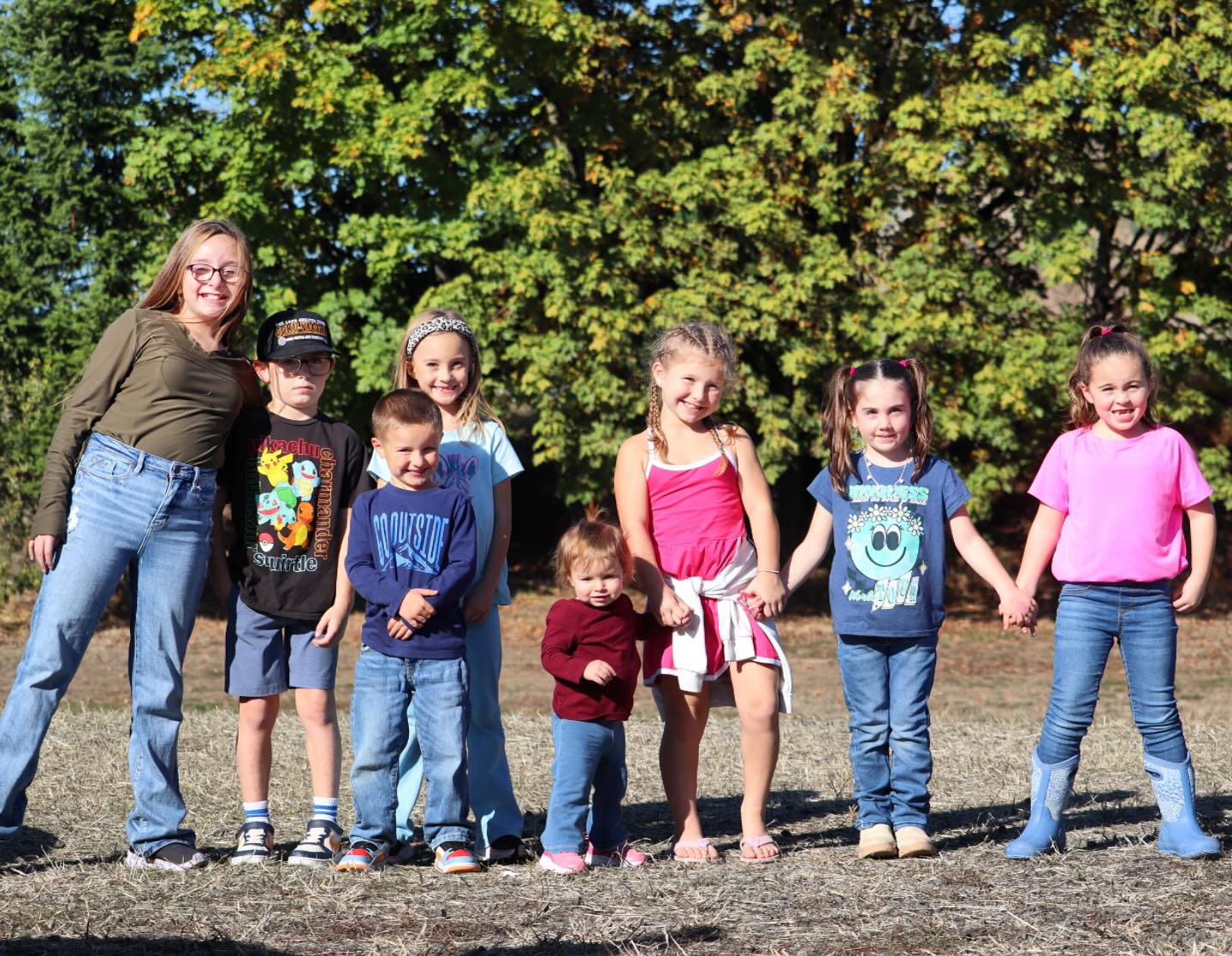 Our socializing team 🎃 these kids rock their job handling and socializing puppies #LKranch #LKBernedoodles