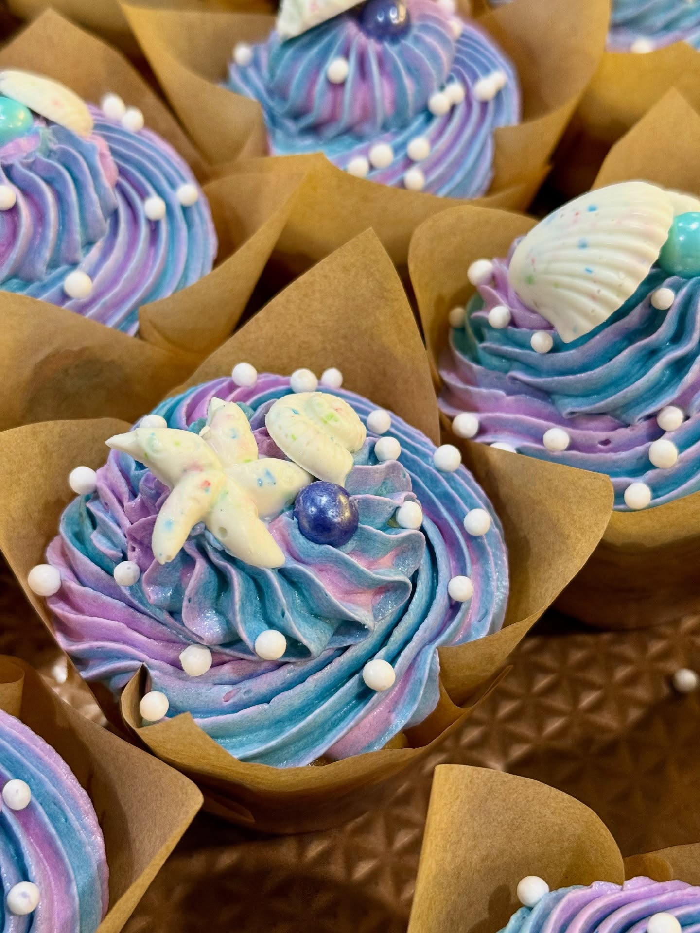 What fun it was to create these ombré swirled, vanilla custard filled, cupcake beauties for a precious little girl who is O-FISHally 2!
