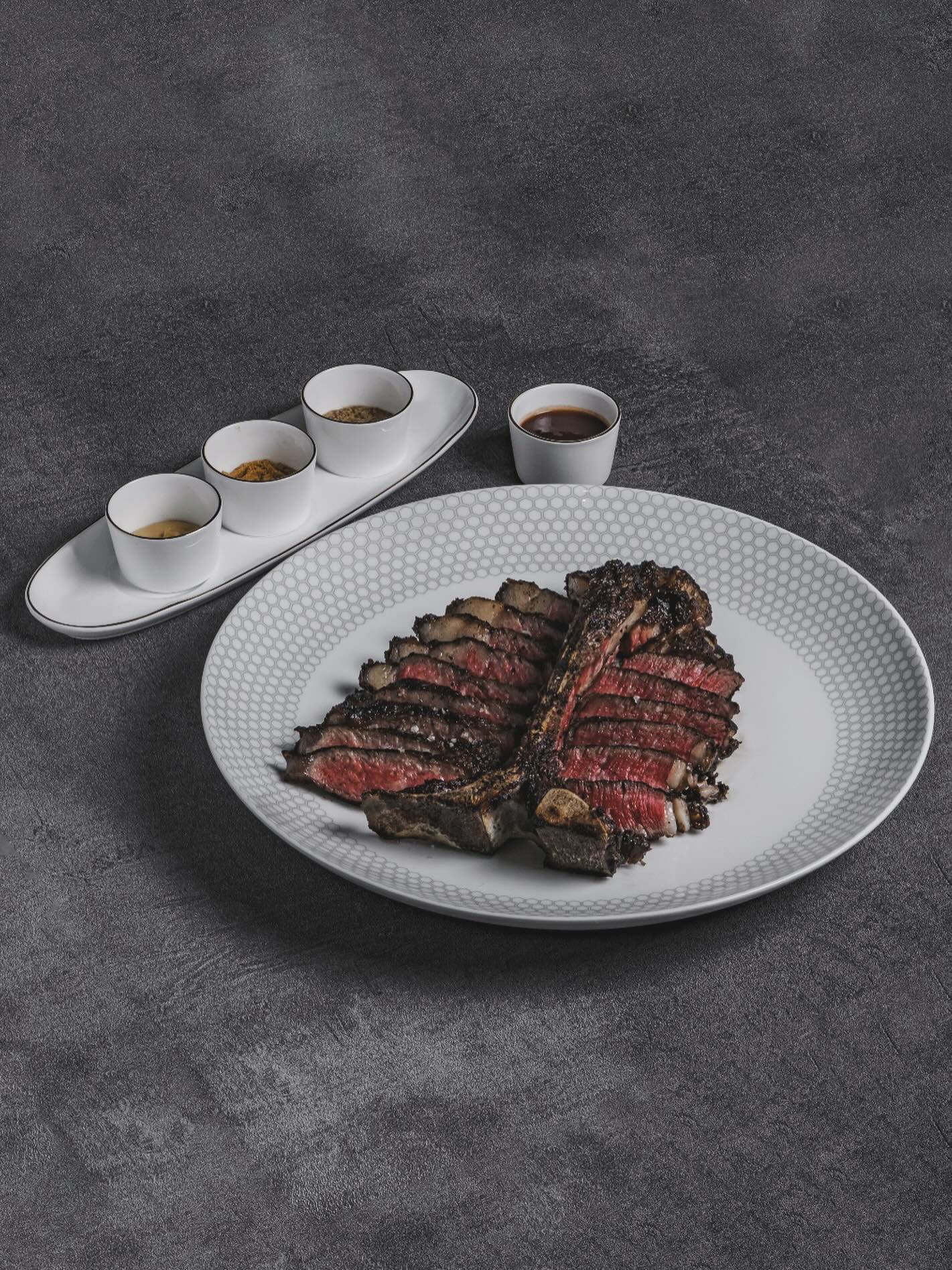 Our featured cut is the Porterhouse from Black Market Beef by @rangersvalley, a personal favourite of Chef Andrea.
This exceptional cut offers melt-in-your-mouth tenderloin and striploin with rich, deep flavours, exclusively available at 54° Steakhouse in Singapore.
Enjoy this dish with our selection of artisanal sauces.
Book your table now via link in bio.
54 Amoy Street, Singapore 069880
#54steakhouse #foodconceptsgroup #amoystreet #rangersvalley #porterhouse #blackmarket #steaklovers #steakdinner #steaklover #steaktime