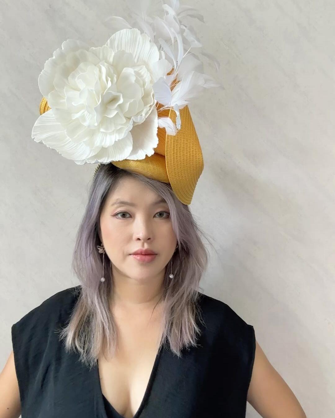 Inspired by Hong Kong, crafted for the world.
Every curve of this mustard-yellow hat tells a story—of bustling city streets, hidden gardens, and the vibrant spirit that makes Hong Kong unique. My designs are a tribute to the city’s energy and the mentors who shaped my creative journey.
Curious about the inspiration behind each piece? Message me to discover the story or book a private fitting. 💛
Thank you for being part of this creative adventure! 🌸