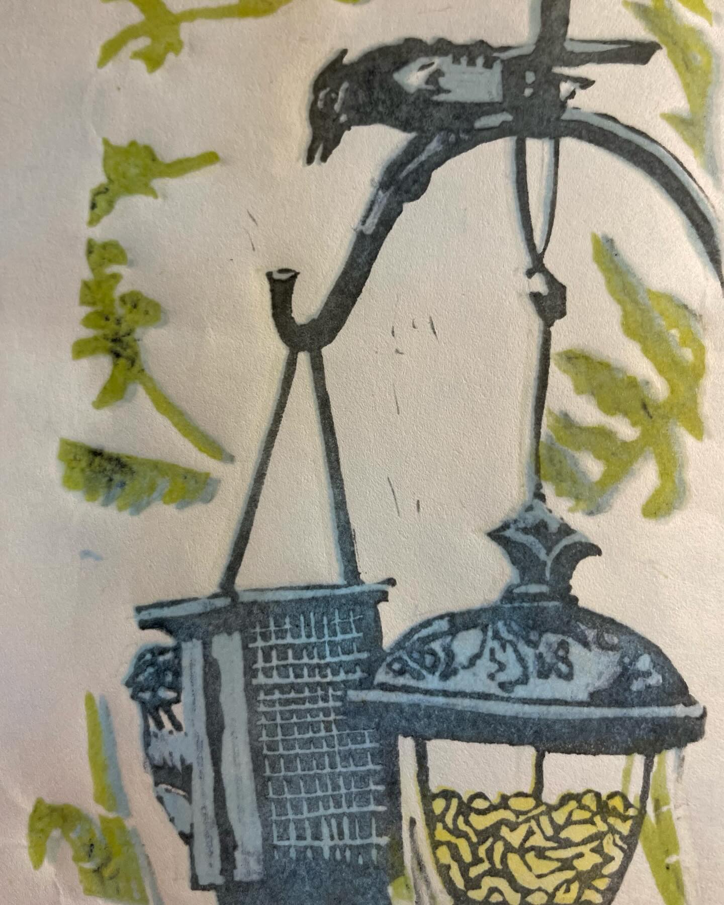 Proofing the first four color layers of this reduction print by doing selective inking/wiping.