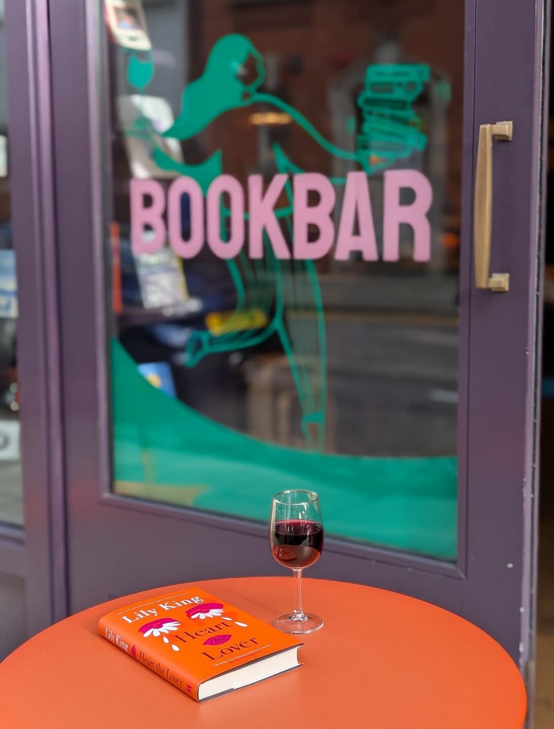 It's your last weekend to get a copy of our Book of the Month, Heart the Lover, and enjoy a glass of our delicious Wine of the Month, a warming Barbera D'Asti from Italy for £7 (instead of £10).
Lily King, the author of one of BookBar's favourite novels of this half decade, Writers and Lovers, returns with this emotionally rich novel about a writer reflecting on a significant relationship during her student days. Heart the Lover is wonderfully witty, empathetic and astute; the whole team cried when reading this elegant book and it's become a team favourite.
Read this curled up with a glass of our wine of the month, a warming Barbera D'Asti 'La Vigna Vecchia' (the old vine) from Piedmont. Ruby, slightly spicy, this is the perfect drop to curl up with on an Autumnal weekend.
Things are even better if you're a Book Club member: you'll get 10% off Heart the Lover for the rest of the weekend.
Come see us at our Highbury or Chelsea shops this weekend - we're open until 9pm tonight and from 11-6pm Sunday.