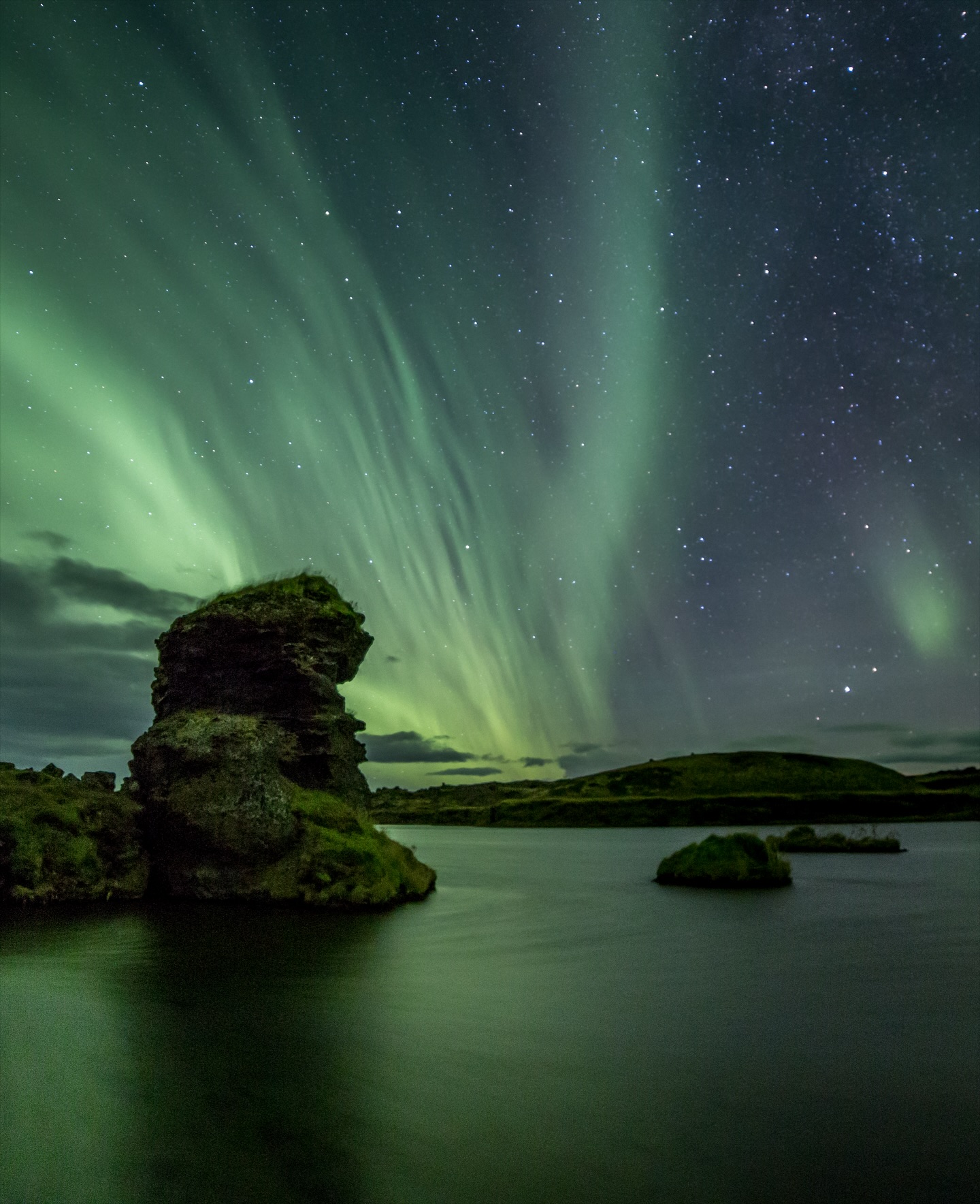 North Iceland hides many Trolls, This one is looking over Lake Myvatn under the Northern Lights. #Aurora #theauroras @voigttravel @inspiredbyiceland @northiceland @visitmyvatn