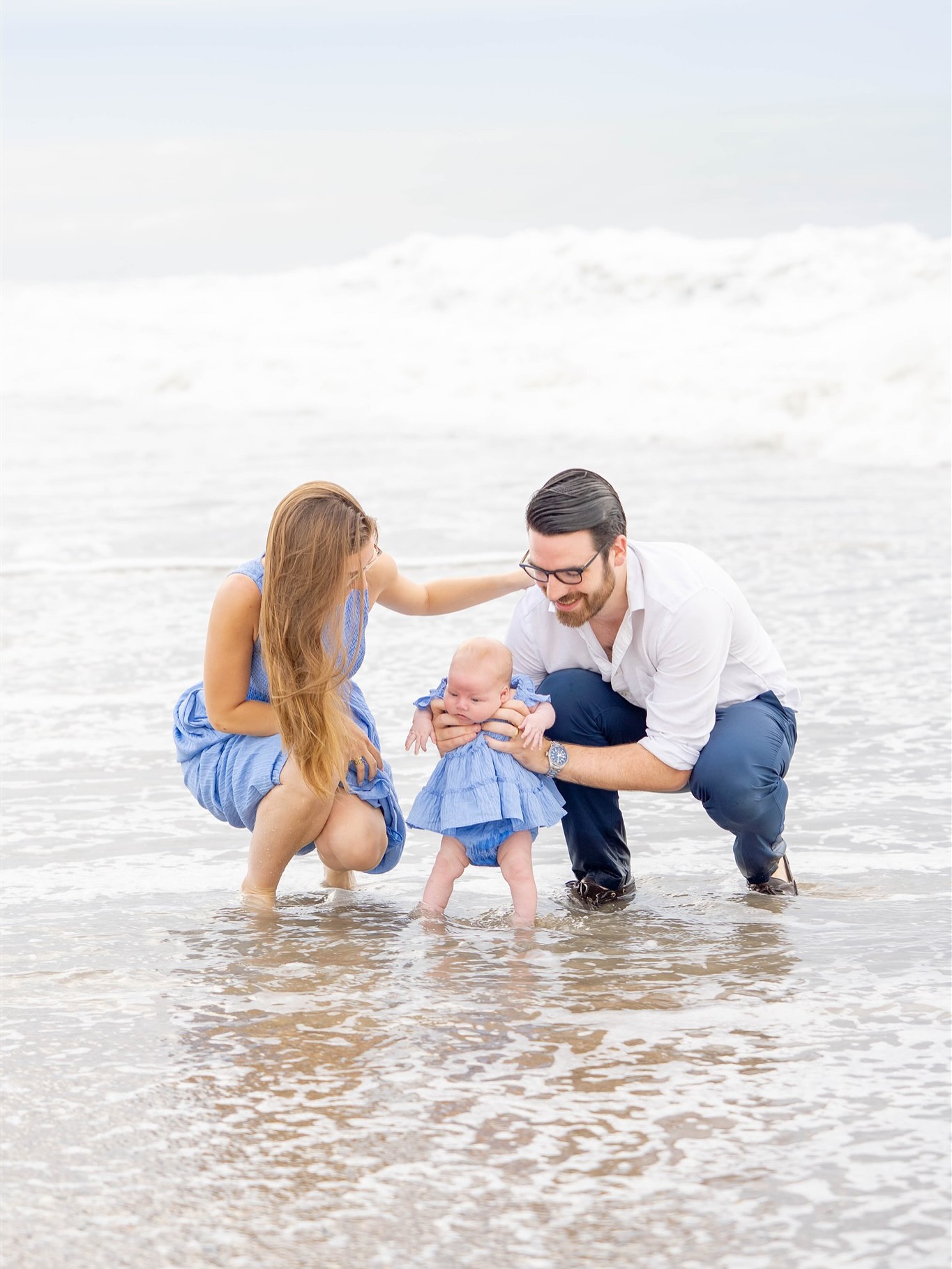 There’s something unforgettable about the first time your baby dips her tiny toes into the ocean. Oh! that mix of surprise and delight as the cool waves kiss her feet, the sound of her laughter blending with the rhythm of the tide. It’s a moment that feels suspended in time, a chapter in your family’s story that deserves to be remembered.
As the camera clicks, capturing your firstborn in your arms with the horizon stretching wide behind you, it’s more than just a “photograph” it’s a piece of your legacy.
Having the three generation picture, shows grandmothers who have stood in that same sand, guiding, loving, and shaping generations with their quiet strength and tender wisdom. Their presence reminds us that these moments are not just fleeting; they’re the threads that tie us together.
not only in weddings, but the hiring of a photographer to take professional photos is important when taken in places that hold deep meaning, like your favorite beach, your hometown shore, or the spot where you once played as a child, they preserve more than smiles. Family pictures capture the heart of family, heritage, and love through the generations.
Always so happy to book these. 💕
#NorthCarolinaPhotographer #EmeraldIslePhotography #CrystalCoastPhotographer #NCBeachPhotography
#CoastalCarolinaWeddings