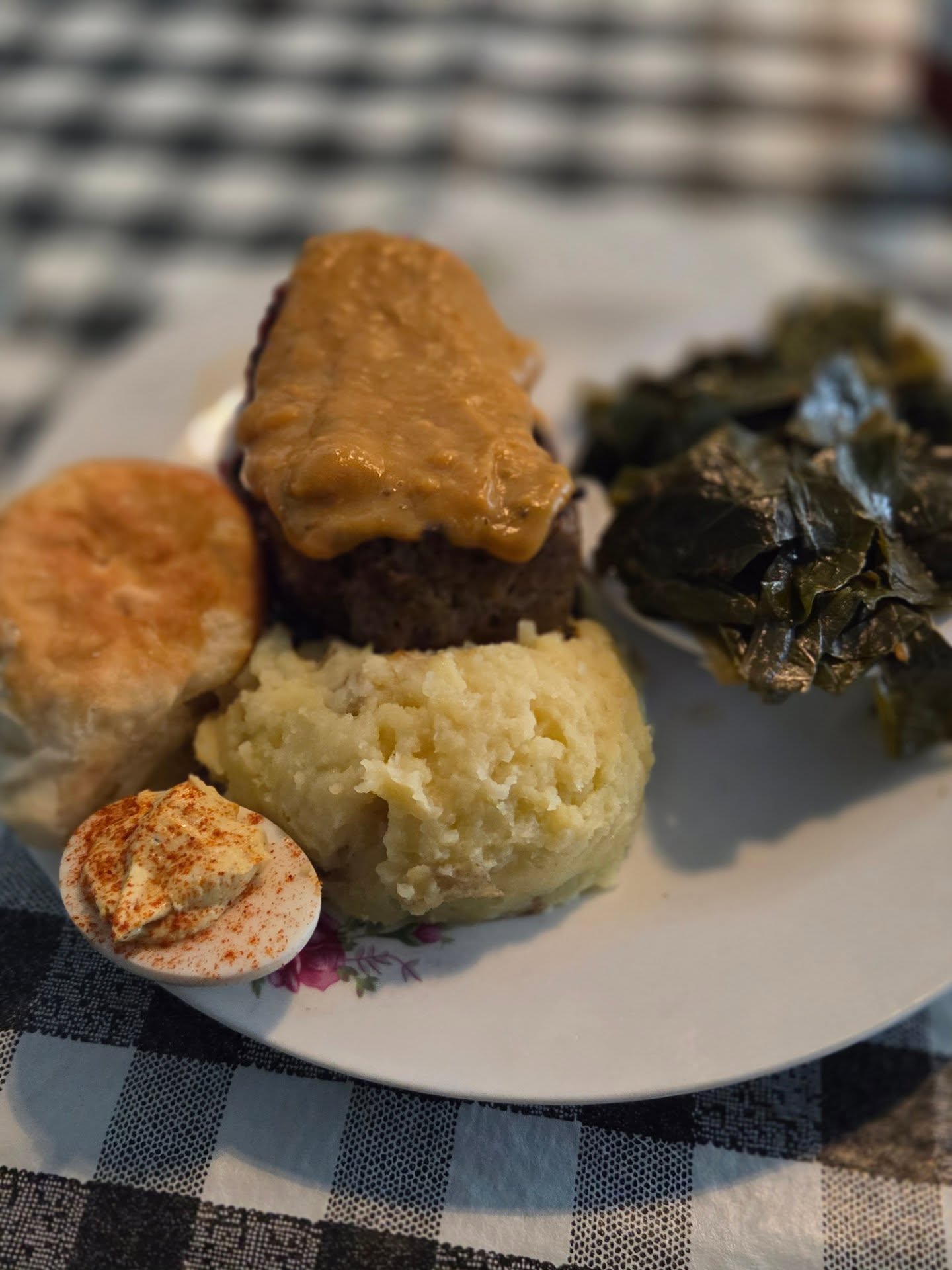 Spicy Meatloaf with mashed potatoes, collards, deviled egg and biscuit from @eatatdish
#meatloaf #spicy #collards #deviledegg #biscuit #clt #charlotte #plazzamidwood #munchandmeandernc