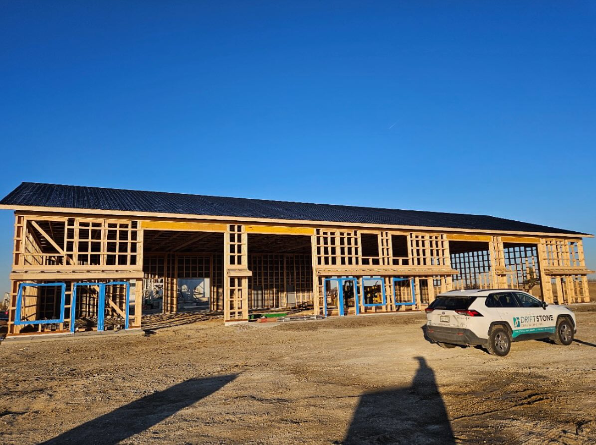 The Tri-Star Redi-Mix Building 2 in Pilot Butte is taking shape.
Our team designed the full structural package for this 4-bay, 60’ × 136’ wood-framed shop — and it’s rising fast.
Delivering Communities. Building Saskatchewan.