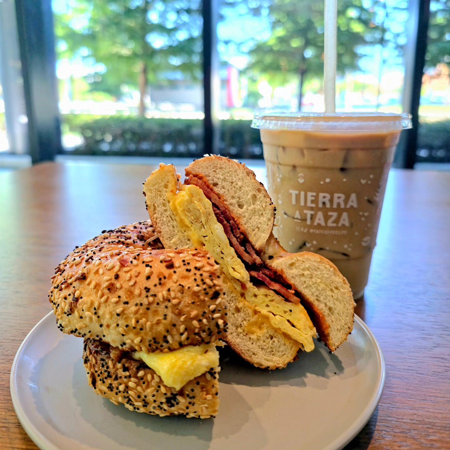 Start your day right with our ultimate breakfast duo! Our popular bacon, egg, and cheese bagel features our unforgettable house-made chipotle aioli, perfectly complemented by a crisp iced latte. It's the perfect way to fuel your morning.
#tatcoffeelife #tatcoffee #bagel #Dallascoffee #dallascoffeeshop