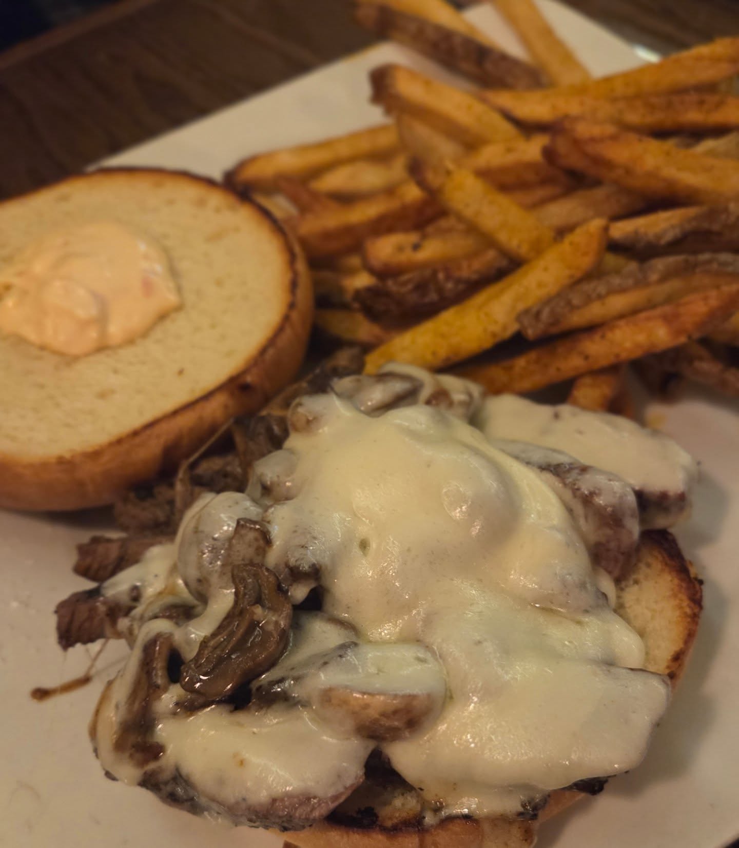 Brooks Serloin Melt from @brooks.tavern
#serloinsteak #steak #steaksandwich #fries #gigglewater #bar #hendersonvillenc #hendo #munchandmeanderwnc