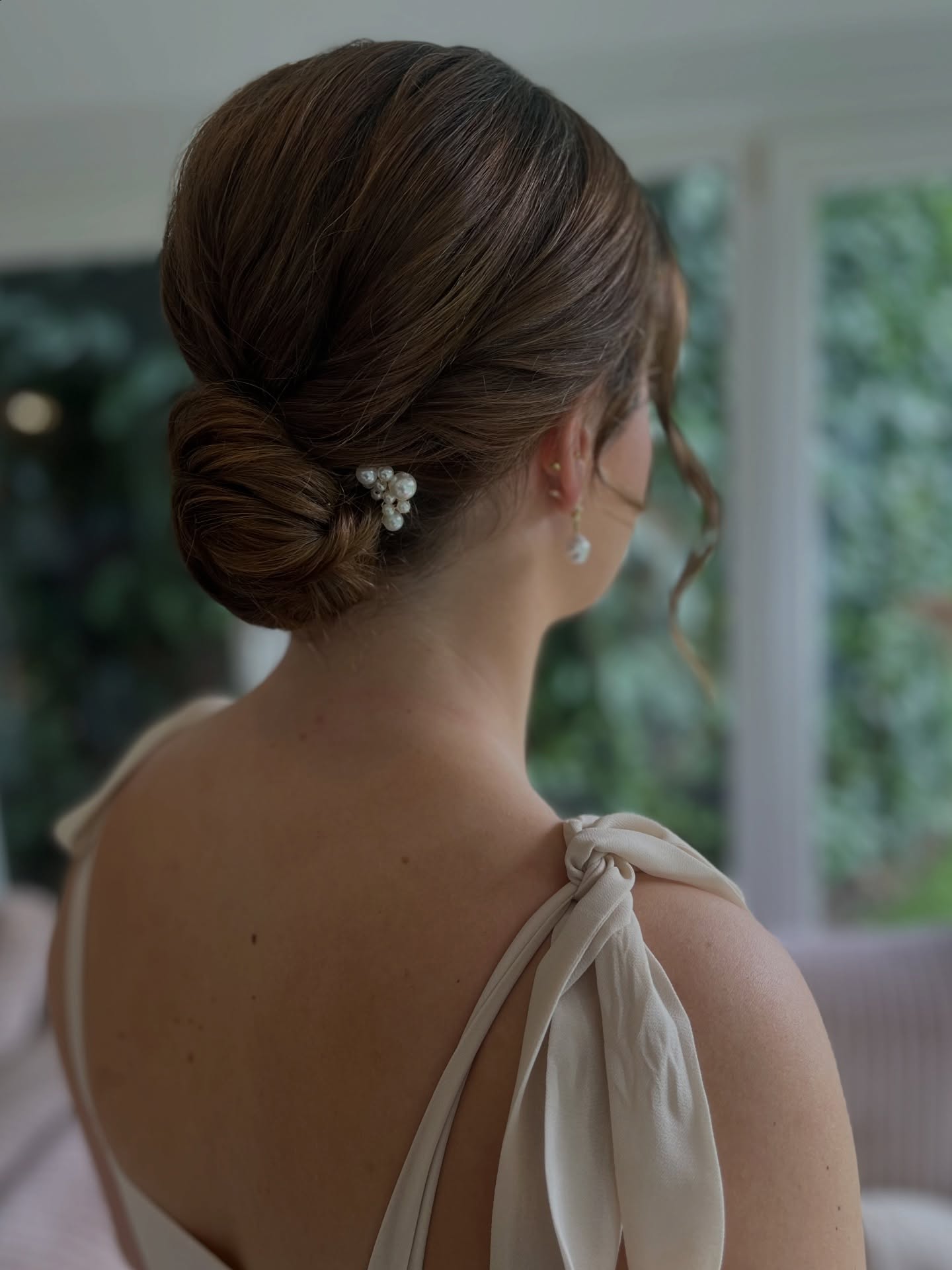 Another beauty from that morning 🤍
I loved creating this soft, low bun for all of Bronte’s bridesmaids. So elegant, relaxed and perfectly in keeping with the feel of the day. The little pearl pins just finished the styles off so beautifully!
I always love how the same hair style can look completely different depending on someone’s hair colour and texture. On this bridesmaids hair, the soft twisted bun looked so glossy and defined. The perfect match for her bridesmaid look.
I’ll never get tired of mornings like these, surrounded by lovely people, good energy and hair that makes everyone feel amazing 💕
#bridesmaidhairinspo #bridalbunhairstyle #dorsetbridalhair