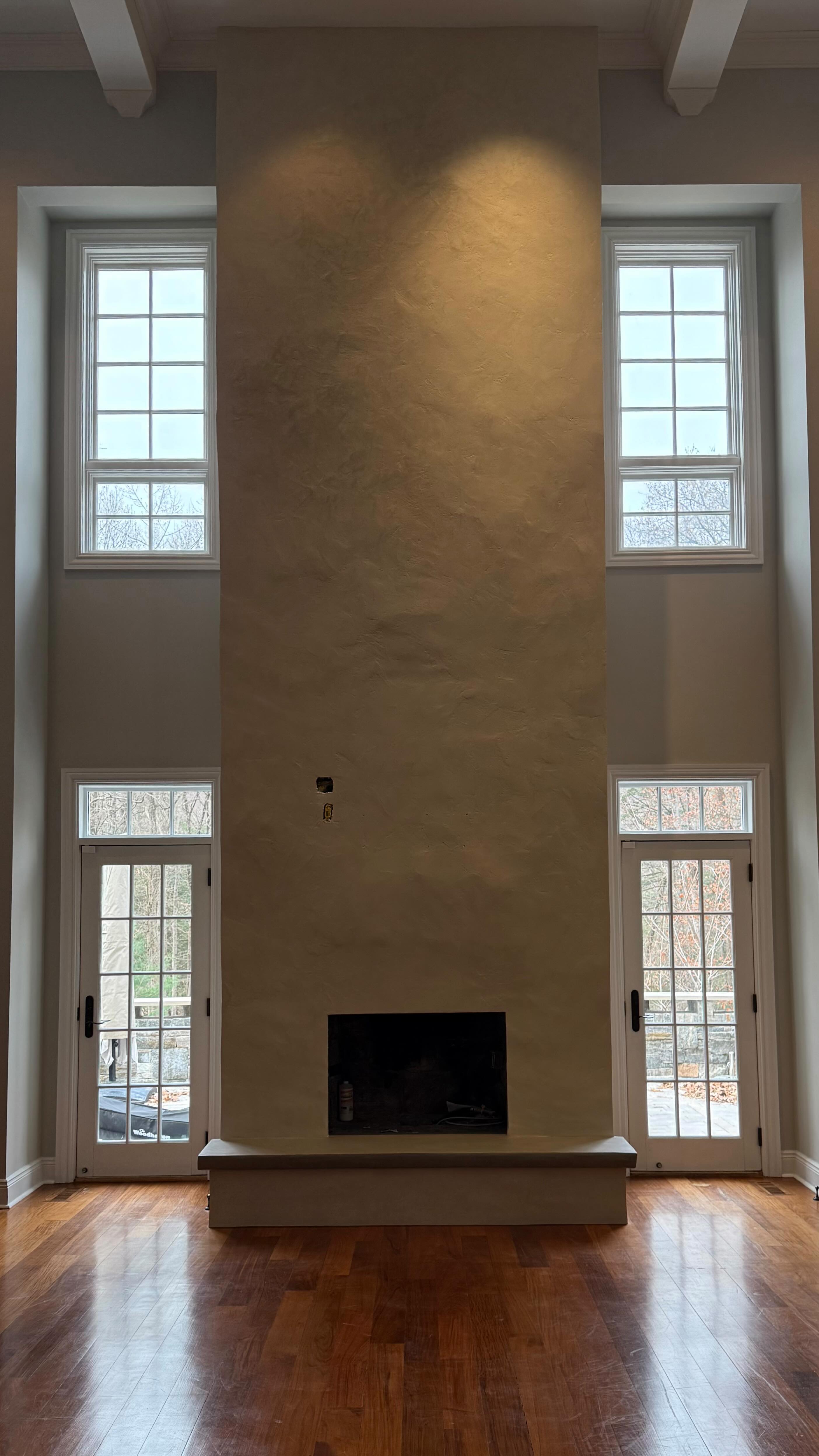 What once stood heavy and traditional now feels sculptural and serene. A 22 foot fireplace transformed from New England Fieldstone into a softly textured marmorino plaster statement. Here it is revealed in a satisfying timelapse from protection to perfection.
Beneath the plaster, the original bluestone’s subtle curves and organic imperfections remain, giving the surface soul, depth, and a one-of-a-kind character that perfectly balances refinement with authenticity.
#luxuryliving #fireplacemakeover #plasterart #plaster #venetianplaster