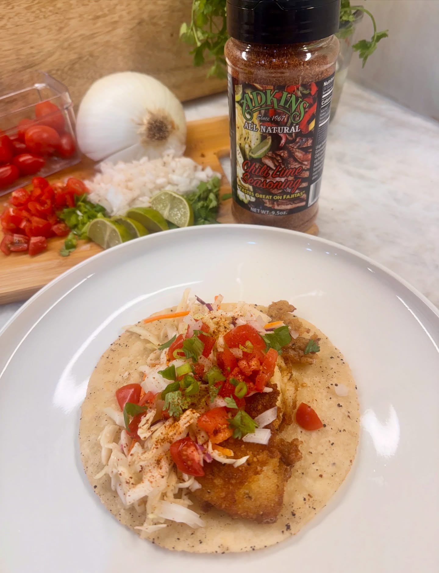 Butter-garlic battered fish tacos with a citrus finish.
Crispy, golden fish with rich butter-garlic flavor, fried until crunchy and finished with a zesty chili-lime pop. Piled onto warm corn tortillas with cabbage, fresh pico, and a squeeze of lime.
Save this for taco night! 🌮
Seasonings & full recipe at adkinsbbq.com
