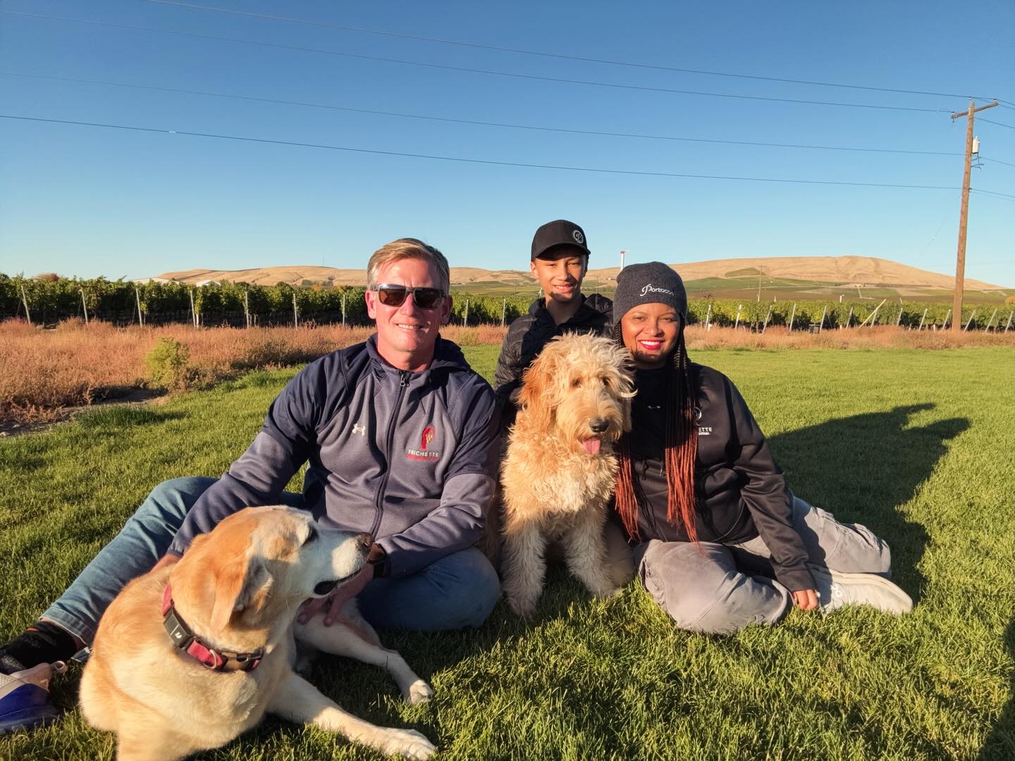 Happy Thanksgiving from our family (pups included!) to yours. We’re closed on Thanksgiving day to slow down, give thanks and eat (and wine).
We wish you a day full of joy, good food, and moments that allow you to pause and smile.
We’ll be back open Friday from noon to 5 PM and can’t wait to welcome you back to Red Mountain.
Cheers,
Greg & Shae Frichette