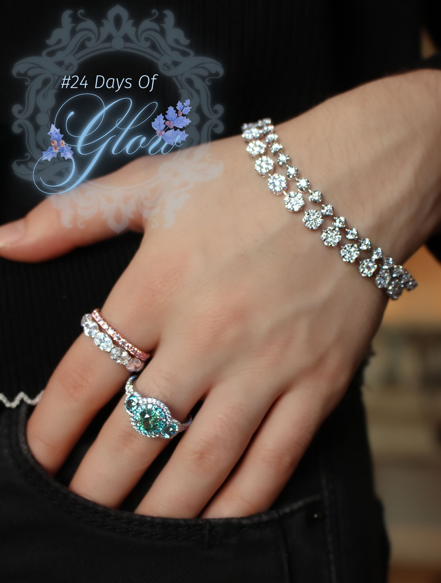 As the OMI Speakeasy comes to a close, Day 15 of #24DaysofGlow brings you an ethereal stack to seal the magic of a jewelful weekend. The star of the show is a three-stone Demantoid Garnet ring with a double halo of electric Paraiba Tourmalines and icy Diamonds. Also shown is an east-west oval Diamond band paired with the baby pinks of the Argyle Pink Diamond eternity band, styled with the most chic 2-strand round Diamond bracelet.
It’s giving jewelry connoisseur energy.
#jewelryadventcalendar #demantoidgarnets #jewelrystack