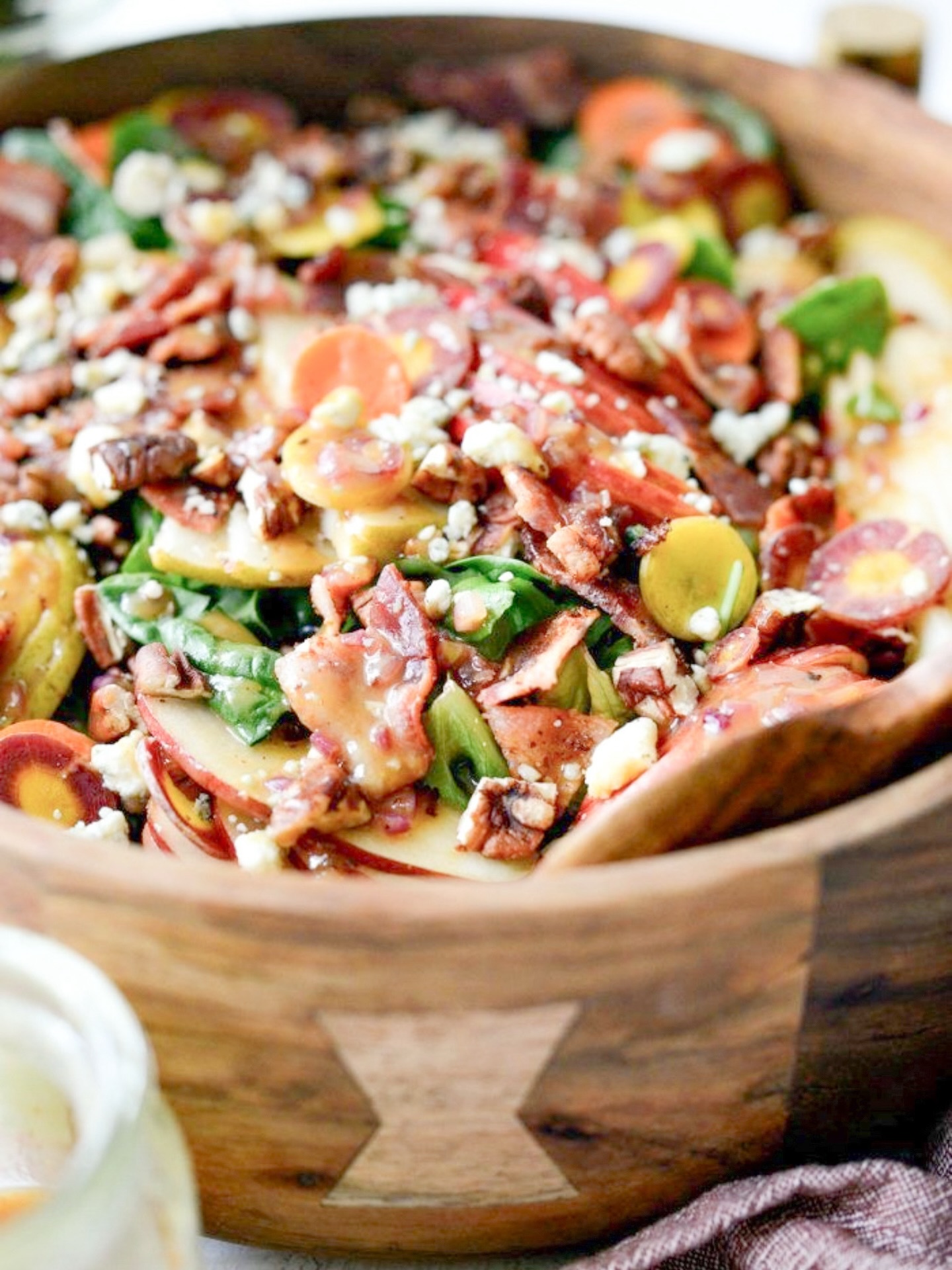 Our Apple Harvest Salad is all about warm flavors and the beauty of fall and winter. 🍂✨
⠀⠀⠀⠀⠀⠀⠀⠀⠀
Both crisp and colorful, this salad features apples, pears, sliced carrots, candied pecans, thick-cut applewood bacon, and blue cheese all piled over mixed greens and finished with our house-made maple vinaigrette.
⠀⠀⠀⠀⠀⠀⠀⠀⠀
Serve it as a standout side, or add any of our proteins to make it a hearty entrée. Trust us, it’s as good as it looks! Place your hearty salad order online at, www.bluemagnoliacatering.com or by phone at, 850.502.7406.