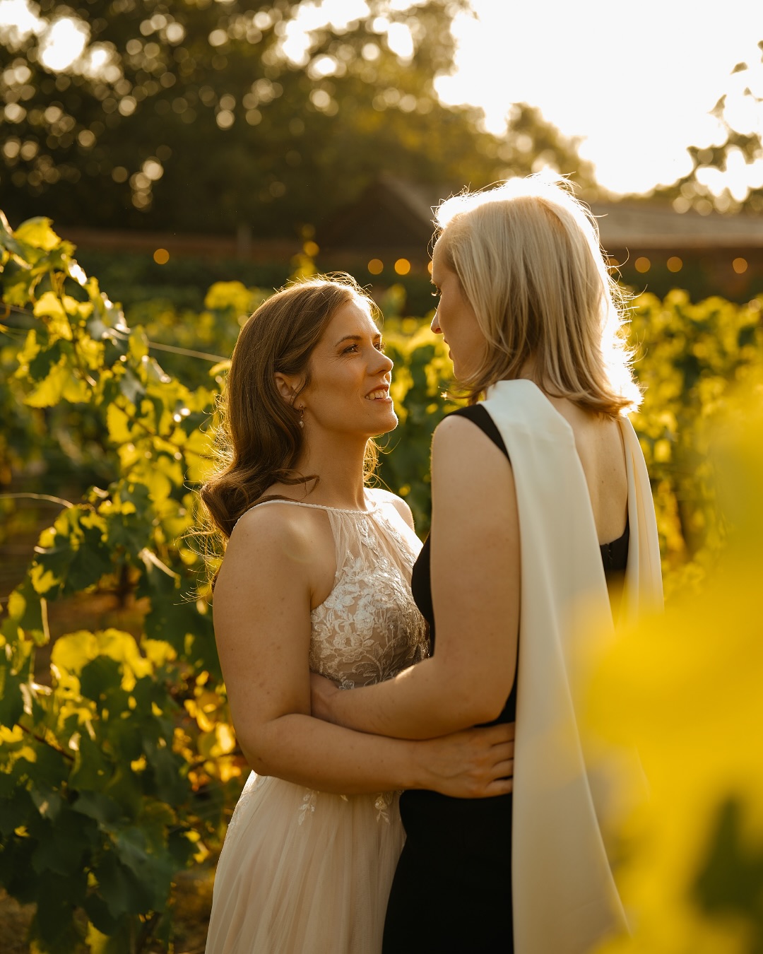 Steph (she/her) & Zanna (she/her)
Steph & Zanna’s August wedding was the perfect reminder that there is no one way to do your day - and these two absolutely nailed doing it their way. Their ceremony was led by a very funny friend, lasted no more than 10 minutes, and set the tone for everything that followed: family, friends, joy, and a whole lot of laughing. Honestly… the vibes were immaculate from start to finish.
It was also such a gorgeous example of how we work intuitively with our couples. Rather than pulling them away from their people for a long portrait session, we dipped out for tiny pockets of time throughout the day - a few minutes here, a few minutes there - always keeping them in the flow of the party.
And the payoff?
A spontaneous 5-minute wander into golden hour, soft light spilling over the vineyards, and some of the dreamiest, most tender portraits. Nothing forced. Nothing staged. Just two people wildly in love, soaking up their day.
Weddings don’t have to follow a script. They don’t have to look a certain way. They just have to feel like you - and this one did in every single moment 🖤
Suppliers from the day;
Photo & Video - @rebelloveclub_
Venue - @stanlakeparkweddings
Florist - @lilyandliz
Magician - @deanleavymagic
Catering - @fingersandforks
Band - @backstreetnoiseband
#lgbtqweddingphotographer #ukweddingphotographer #lgbtqwedding #weddingalbum