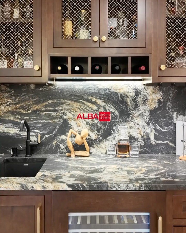 Our recent kitchen project features a bar section made with our custom inset cabinets and blended with our leathered finish titanium countertop. #barsection #kitchencountertopideas #kitchenupdateideas #quartzite #bargoals
Photos & Videos: Celine & John