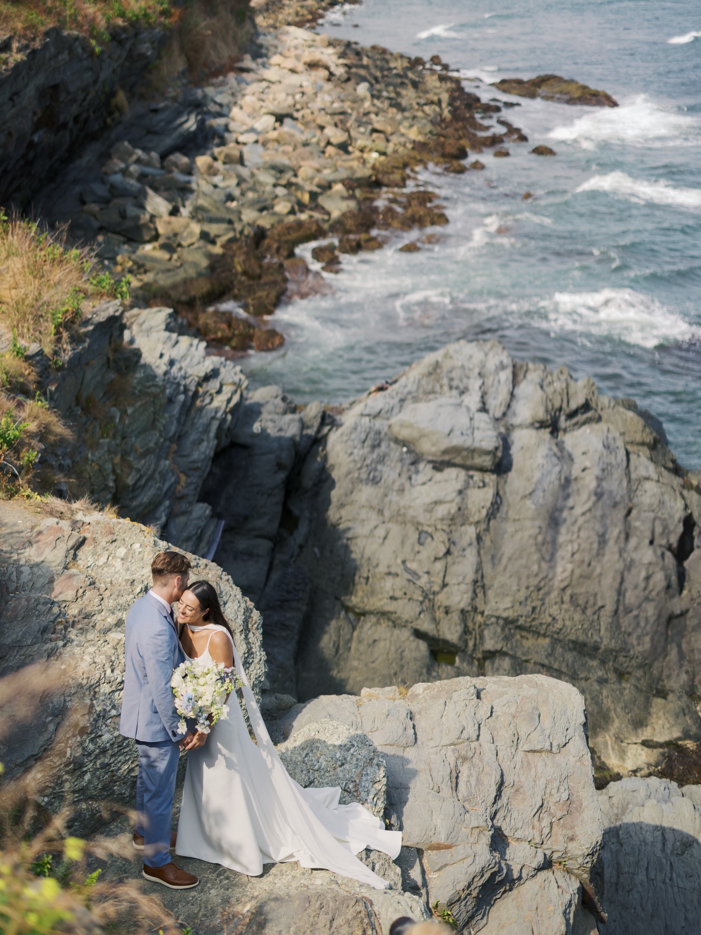 Salt air, soft light, and a love that feels at home by the sea. Newport’s coastal cliffs gave these two the perfect place to begin their forever. Bridal portrait session perfection with A&J on their special day 🌊✨
#newportwedding #newenglandweddingphotographer #newportweddingphotographer
.
.
.
Venue @longwoodvenuesanddestinations
Florals @jennyeventsco