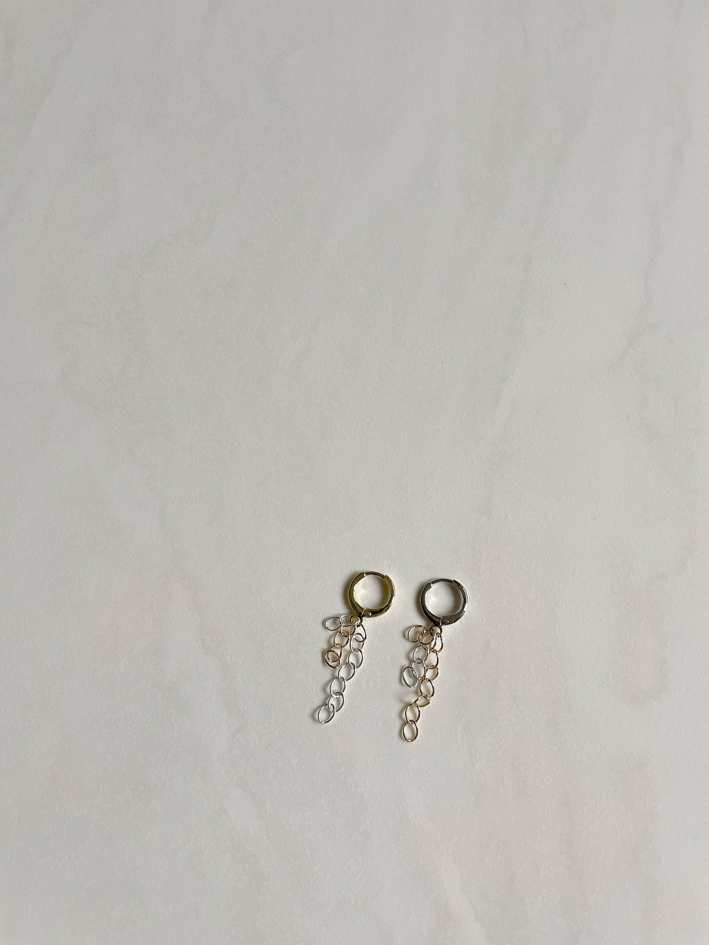 Untethered. ⛓️💥
𝗡𝗮𝗺𝗲 𝗺𝗲𝗮𝗻𝗶𝗻𝗴: Release; freedom; letting go of what once held you down; stepping into lightness. Symbolicly wearing “the chains”.
•
𝗕𝗲𝗰𝗼𝗺𝗶𝗻𝗴 𝗟𝗶𝗴𝗵𝘁 𝘊𝘰𝘭𝘭𝘦𝘤𝘵𝘪𝘰𝘯 was born in the quiet moments after everything fell apart. In the aftermath of heartbreak, grief, and letting go, I found myself standing inside a version of my life I barely recognized. In the quiet that followed, I met myself again — slowly, gently, honestly. This collection is the story of that growth. Of learning to breathe again. Of choosing softness without surrendering strength, and choosing myself without apology. Of letting the light back in one small moment at a time. Each piece is designed to carry the energy of lightness, not as something fragile, but as something powerful — the kind of light you grow into after walking through the dark. Pearls represent emotional healing and truth. They carry the memory of every tear that became wisdom. Crystals hold clarity and new beginnings. Gold and silver together symbolize balance: the merging of who you were with who you are becoming. May these pieces remind you that you are allowed to outgrow your past, to rise from what hurt you, and to shine in ways you never have before. You are stepping into the new year as the highest, most loving version of yourself, choosing peace over chaos, softness over fear, and self-belief over doubt. You are not just healing. 𝗬𝗼𝘂 𝗮𝗿𝗲 𝗕𝗲𝗰𝗼𝗺𝗶𝗻𝗴 𝗟𝗶𝗴𝗵𝘁.