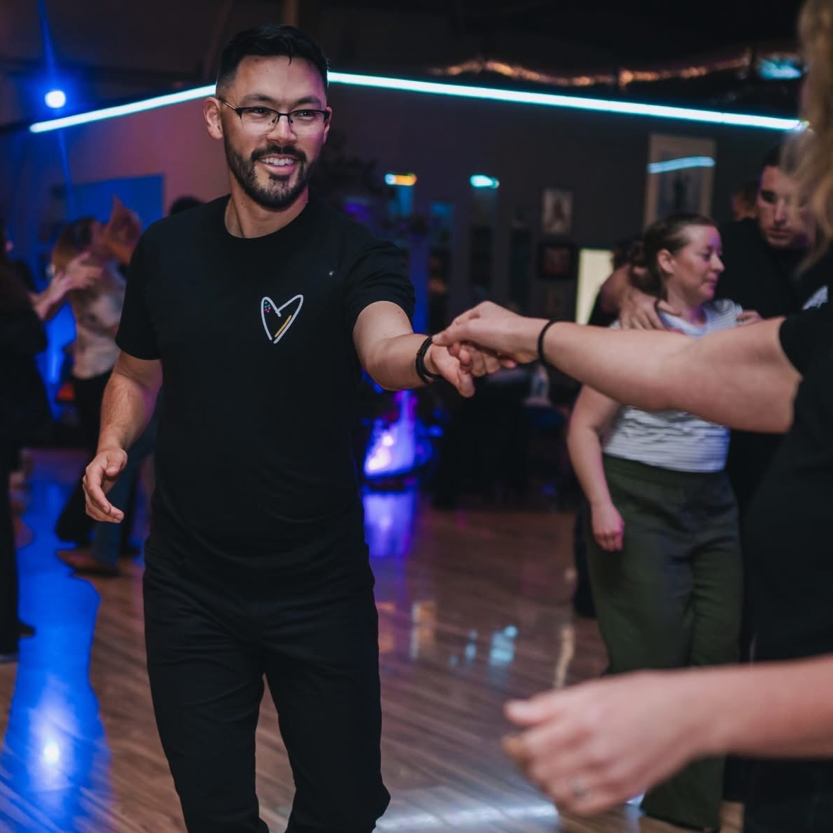 Join us for three levels of West Coast Swing classes every Monday, starting with WCS Basics at 6:30pm— tonight Conor McClure will be teaching all three levels of class!
From there, we have Level 1 at 7:30pm and Level 2 at 8:30pm.
Please note that the WCS Basics class is a progressive series— tonight is first night of the series so it’s a perfect time to join!
If you can’t make it to the WCS Basics on Monday nights, we also have a second series every Tuesday at the same time.
✨✨✨
Class Descriptions:
Basics - 6:30pm
Level 1 - 7:30pm
Level 2 - 8:30pm
WCS Basics: The WCS Basics class is a repeating monthly class that introduces the fundamental elements of West Coast Swing. If you’ve previously taken the WCS Basics class, you’re welcome to drop-in any week of the month. If it’s your first time, we recommend taking the series from the very beginning. If you’re just beginning to explore dancing a second role, we recommend you start here as well. Since this class is introductory, there are no requirements to attend.
Level 1: We recommend taking the WCS Basics class for a minimum of 1-2 months before joining Level 1. If you can comfortably dance your basics to a whole song, you are ready to move up. We encourage you to take both WCS Basics and Level 1 concurrently for several months before joining Level 2, though this can vary depending on your previous dance experience, how frequently you social dance, or if you supplement group classes with private lessons.
Level 2: We recommend taking both Level 1 and Level 2 as you expand your knowledge and get comfortable with the faster-paced Level 2 classes.