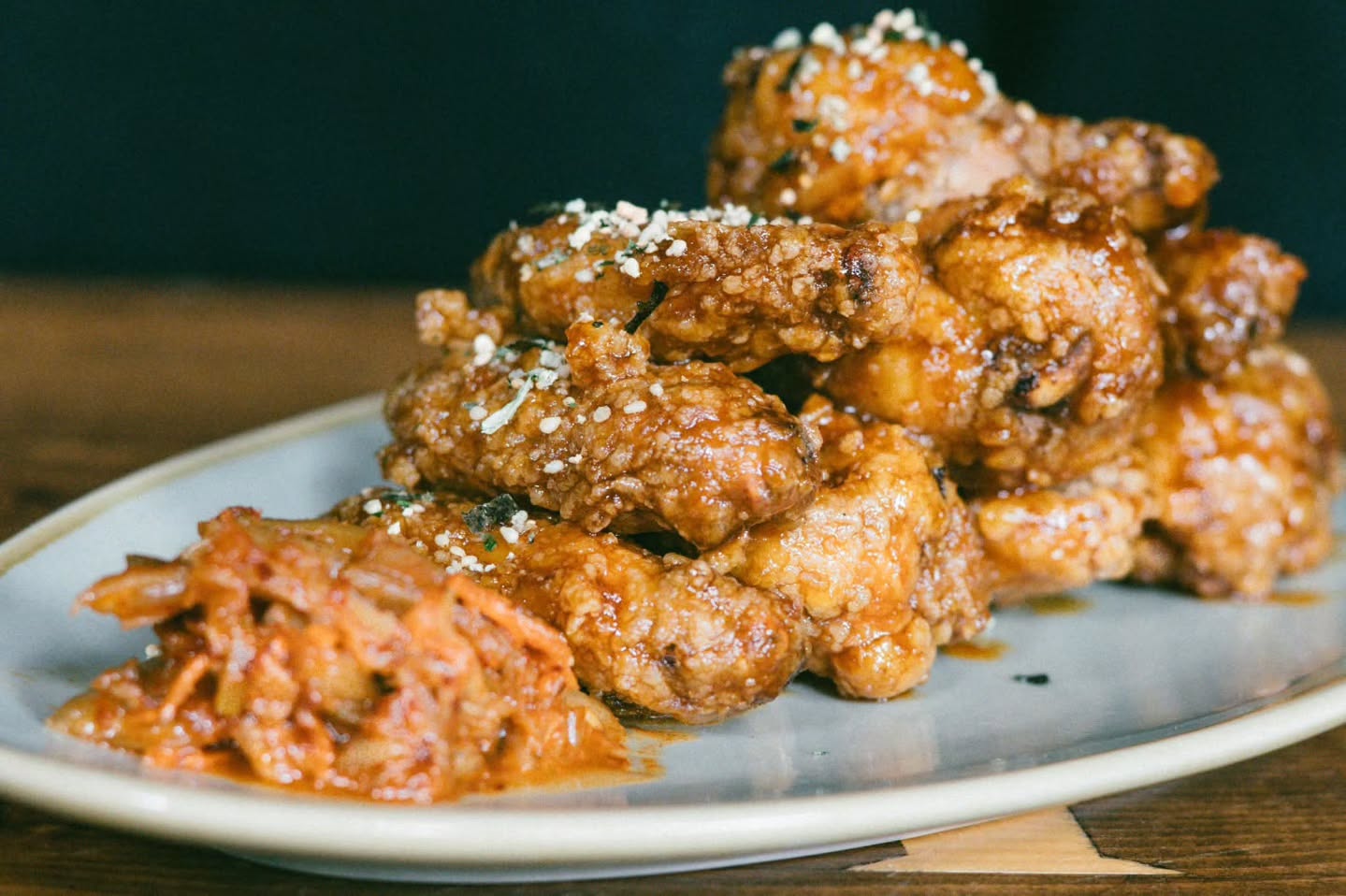 KFC Wings | Maple-soy & lemongrass marinade, rice flour breading, gochujang sauce, house kimchi, furikake