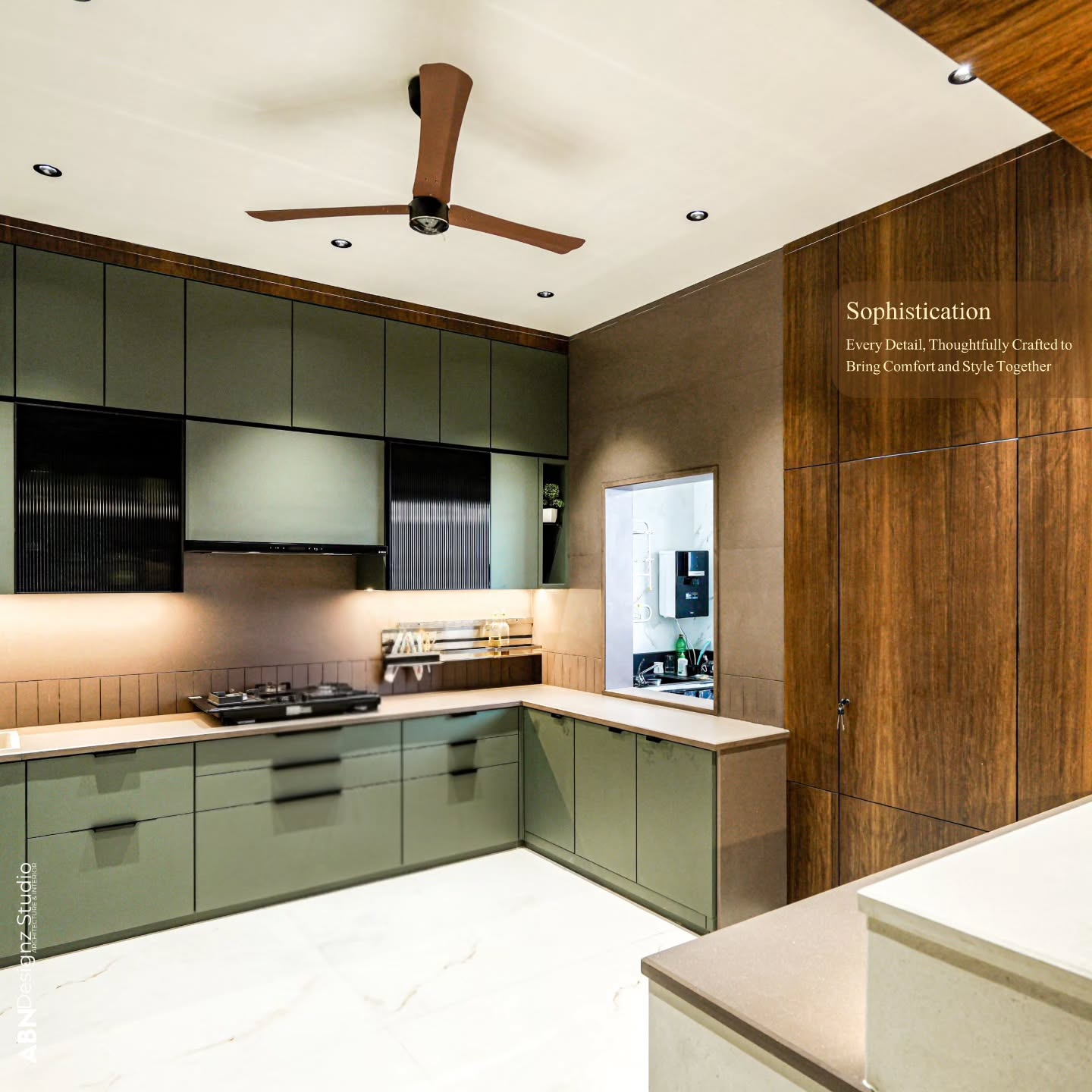 Designing a home is about more than just individual rooms; it’s about how those spaces flow together. Here, we’ve connected the open kitchen and breakfast counter with a stunning vanity corner. The fluted wood paneling acts as the perfect backdrop for that organic-shaped mirror, adding warmth and drama to the dining area.
We believe the heart of the home should be a blend of comfort and style. This kitchen features a soothing sage green palette paired with warm wood textures to create a space that feels both modern and inviting. From the fluted glass cabinets to the under-shelf lighting, every corner is thoughtfully crafted.
Swipe left to see the details up close! 👉
#ABNDesignzStudio #KitchenDesign #ModernInteriors #SageGreenKitchen #InteriorStyling