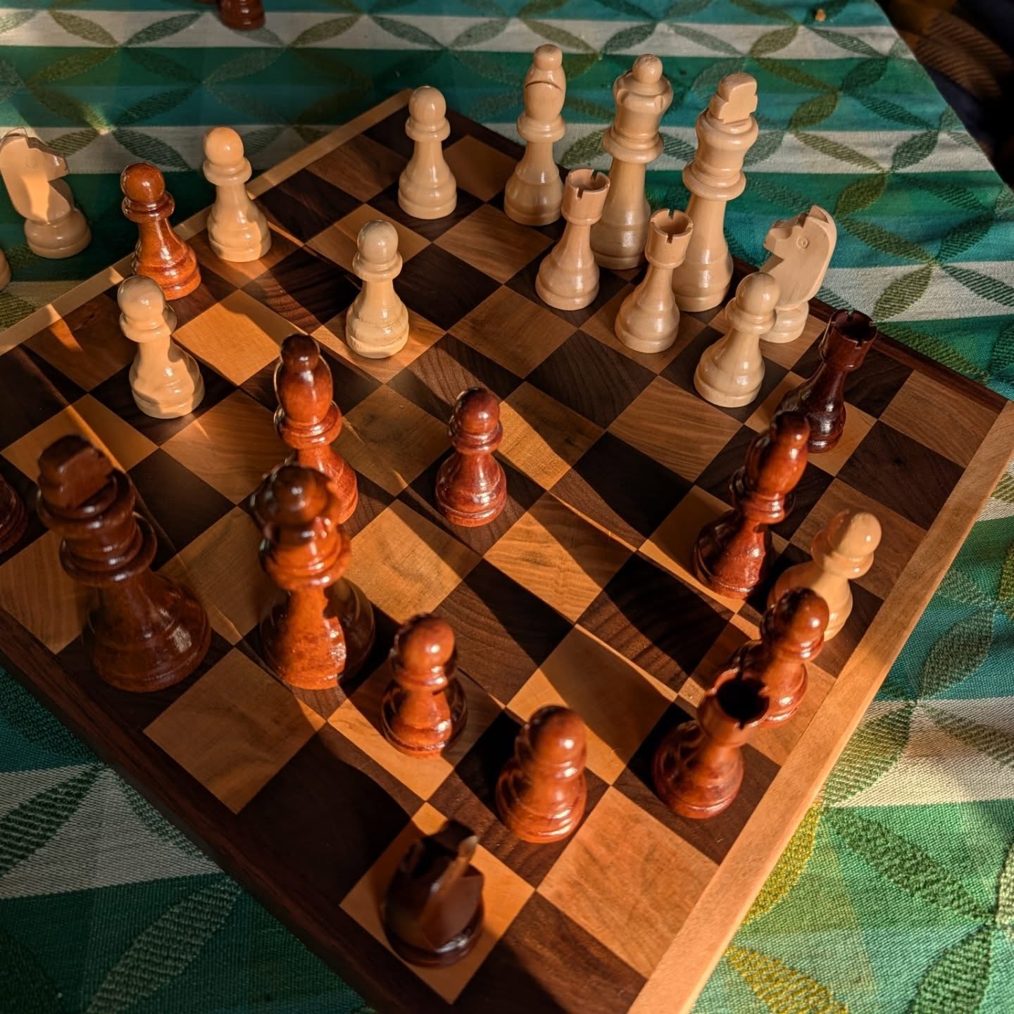 Chessboard for my son from walnut and maple since he has been into chess lately and we didn't own a chess set.
The maple came down in our backyard about thirteen years ago after moving into our Eastown home. I knew I held onto those scraps for a reason.
I did not whittle the pieces... had to rely on the Elves for those.