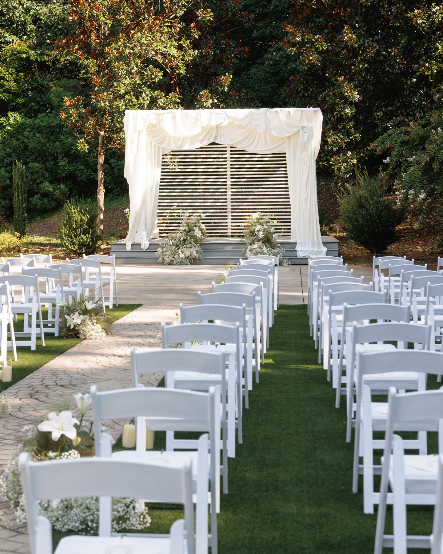 An aisle that leads to forever 🤍
Soft white florals, a gracefully draped ceremony backdrop, and a serene outdoor setting create the perfect atmosphere for saying “I do” at Villa Magnolias Event Center. Thoughtfully designed and surrounded by nature, this space captures timeless elegance and understated romance—allowing the love story to remain the true focal point.
For couples dreaming of a refined outdoor ceremony with classic Southern charm, this is where your story begins.
Photo & Video: @jacksonandnina
Gown: @wona.bridal
Hair & makeup: @liza_ray @beautyiconnyc
Florals: @edenrose.florals
#VillaMagnoliasEventCenter #GreensboroWeddingVenue #NCWeddingVenue #TimelessWedding #ElegantCeremony #WeddingInspiration #LuxuryWeddingVenue