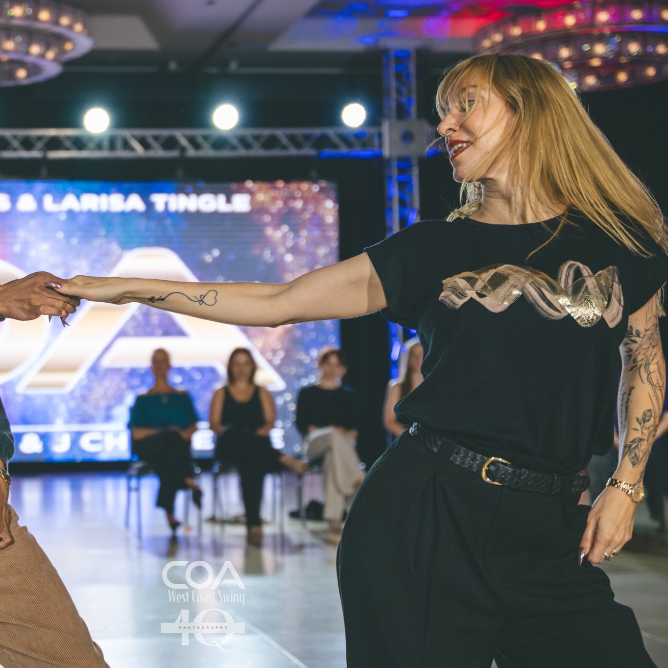 Join us for three levels of West Coast Swing classes every Monday, starting with WCS Basics at 6:30pm— tonight Larisa Tingle will be teaching all three levels of class!
From there, we have Level 1 at 7:30pm and Level 2 at 8:30pm.
There aren't Tuesday classes this week, but normally if you can’t make it to the WCS Basics on Monday nights, we also have a second series every Tuesday at the same time! This class will resume January 6th.
✨✨✨
Class Descriptions:
Basics - 6:30pm
Level 1 - 7:30pm
Level 2 - 8:30pm
WCS Basics: The WCS Basics class is a repeating monthly class that introduces the fundamental elements of West Coast Swing. If you’ve previously taken the WCS Basics class, you’re welcome to drop-in any week of the month. If it’s your first time, we recommend taking the series from the very beginning. If you’re just beginning to explore dancing a second role, we recommend you start here as well. Since this class is introductory, there are no requirements to attend.
Level 1: We recommend taking the WCS Basics class for a minimum of 1-2 months before joining Level 1. If you can comfortably dance your basics to a whole song, you are ready to move up. We encourage you to take both WCS Basics and Level 1 concurrently for several months before joining Level 2, though this can vary depending on your previous dance experience, how frequently you social dance, or if you supplement group classes with private lessons.
Level 2: We recommend taking both Level 1 and Level 2 as you expand your knowledge and get comfortable with the faster-paced Level 2 classes.