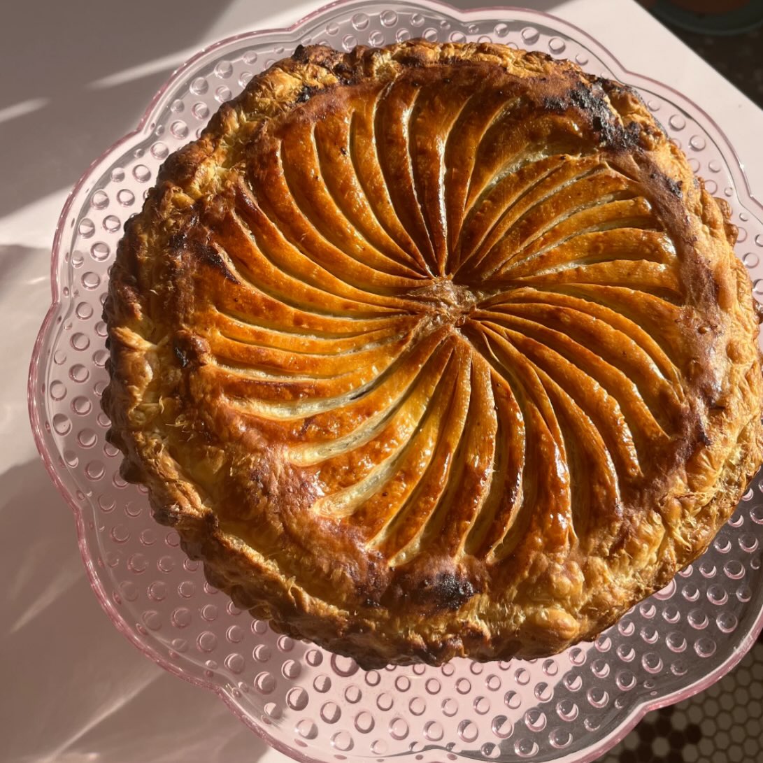 Get your Galette des Rois in time for Epiphany:
Toasted almond frangipane and strawberry jam encased in caramelized puff pastry. Find the hidden almond fรจve and be crowned king or queen for the day!
Weโll have a few available each weekend for walk inโs though Fat Tuesday, but if youโd like a guarantee, preorder for pickup any day you like ๐