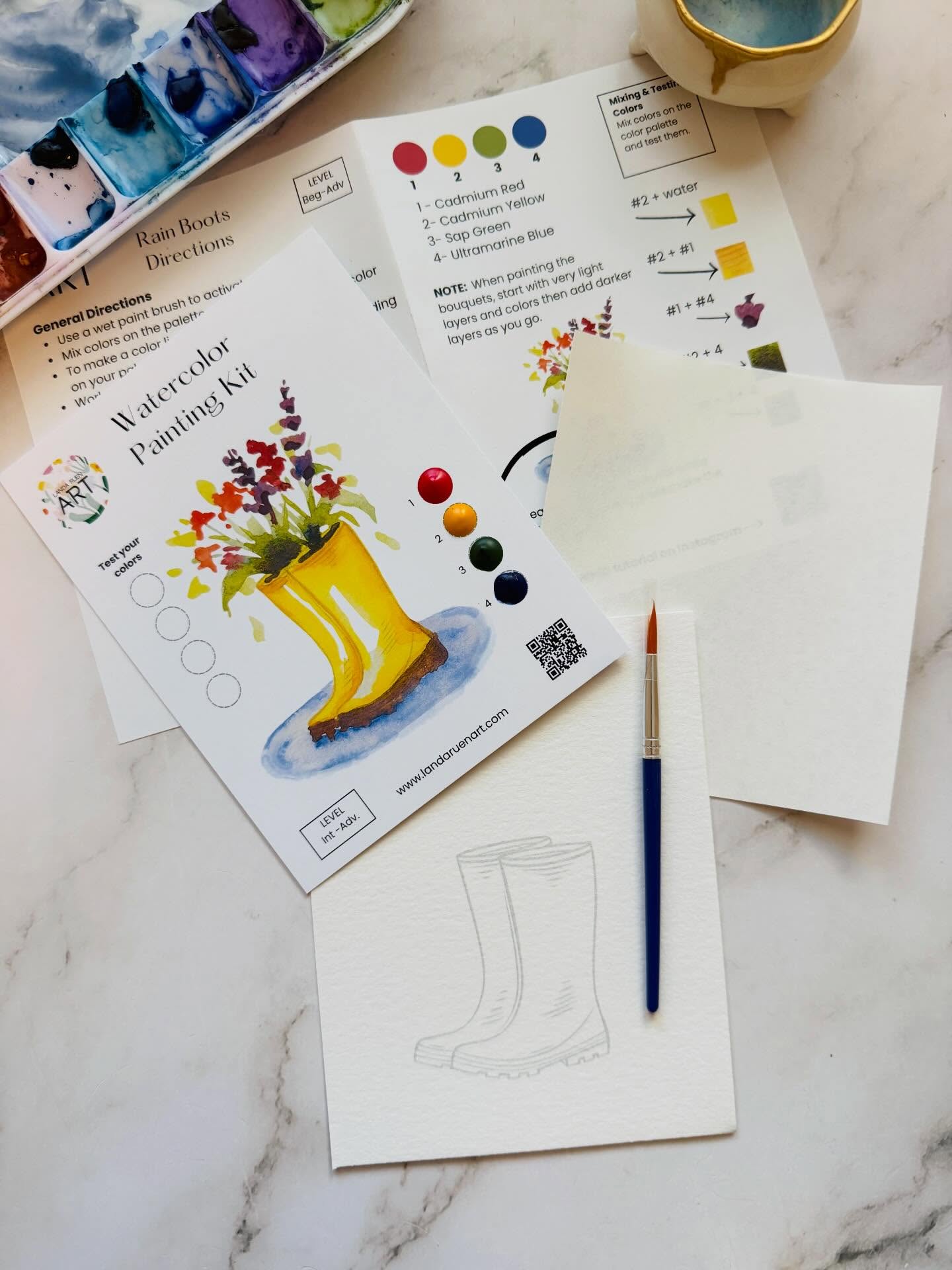 It’s another rainy day here in Northern California which means it’s a great day to do some painting.
This cute little boot bouquet kit was initially a homework assignment that I gave my watercolor students but people loved it so much that it had to become a kit.
Fun fact: the original painting was painted with only 3 colors!
But to make it a tad easier I added a 4th color to the kits.
I’ve been listening to all your feedback too and have some fun new kit designs coming soon! So keep an eye out for those.
As always, happy painting everyone! 🤗🎨
#landaruenartshop #watercolorkits #watercolorkitsforadults #watercolor #landaruenart