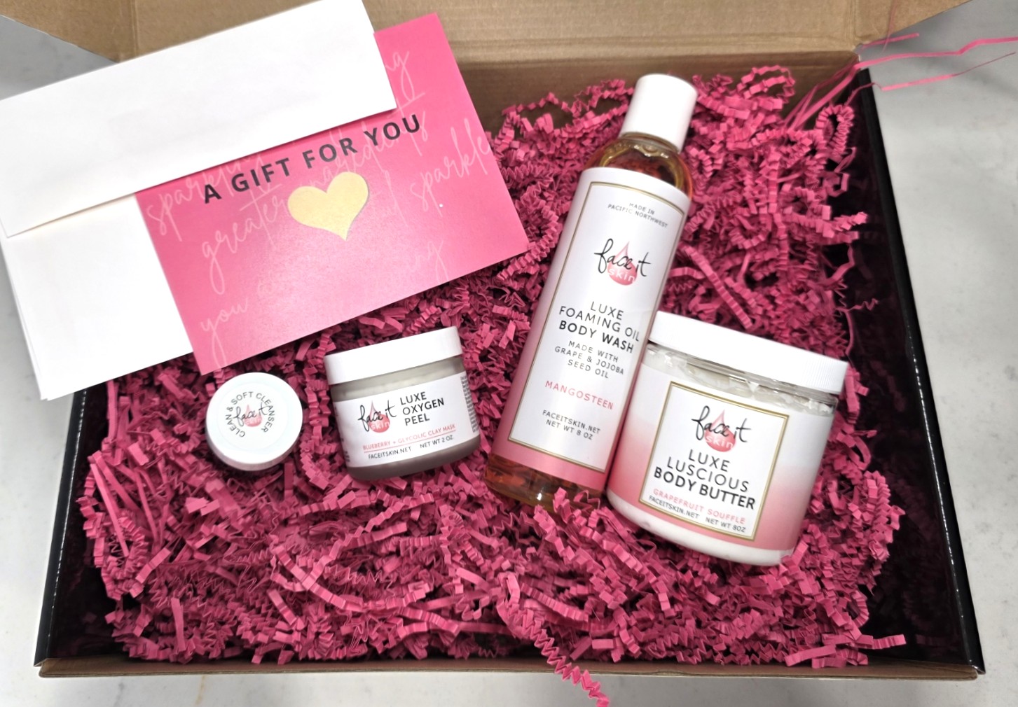 **NEW ✨ Face It Spa Box**
Because presentation matters.
Our new **Face It Spa Box** turns any skincare purchase into a luxe, gift-ready experience. Made from high-quality black cardboard and filled with soft pink crinkle paper, it’s perfect for gifting—or building your own custom spa moment.
🖤 Add your favorite Face It products
🎀 Tuck in personal touches of your own
✨ Instantly elevated, no wrapping required
**Details:**
• $9.99 with select Face It purchases
• **FREE with $155+** in Face It products
• **FREE with a $155 Face It gift card or COMBINATION of both products and gift card**
Whether it’s for someone you love or a well-deserved self-care treat, the Face It Spa Box finishes it beautifully.
👉 Link in BIO to shop
#FaceItSkin #FaceItSpaBox #CleanBeauty #LuxurySkincare #SkincareGifts #SelfCareRitual #PNWBeauty #Refillery #ThoughtfulGifting