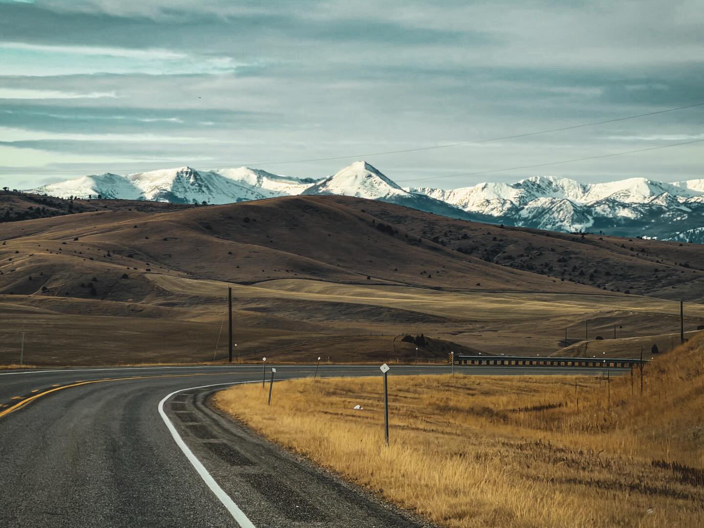 For the first time in a while, I was inspired to take landscape photos…and not just with my cellphone! This winter has been so strange - really warm for Montana. A benefit of no snow on the ground is being able to go for a drive and hike trails we haven’t done in ages.
Today’s adventure brought us to Ennis Lake, where I was drawn to the thin ice mixed with open water and ice shards. The hiking trail had more green than I expected to see in January, and the dog had so much fun scrambling over everything.