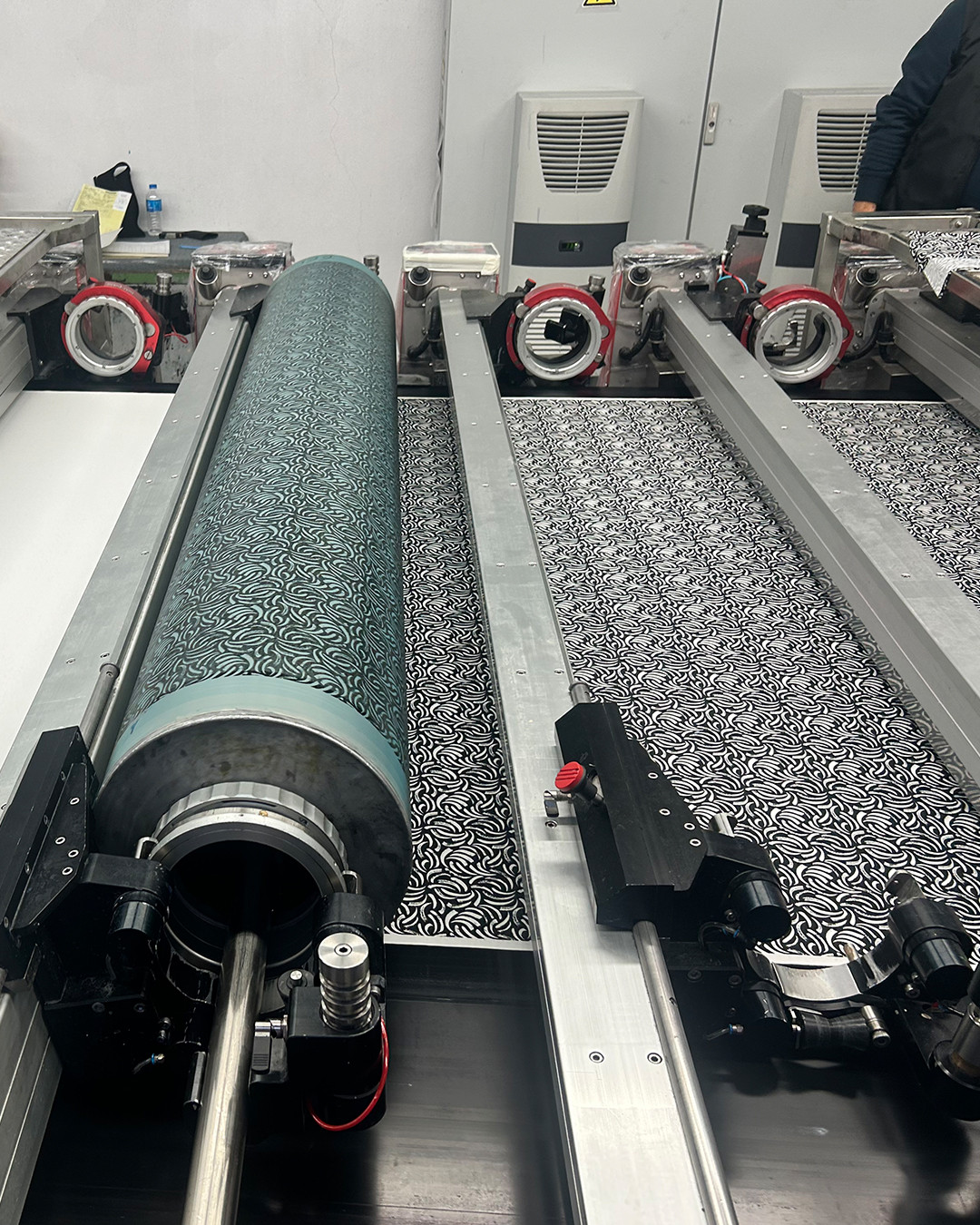 Precision in Motion.
A glimpse from our production floor where advanced rotary
printing meets expert supervision. With cutting-edge
machinery and an eye for detail, we bring bold ideas to life
on fabric seamlessly and sustainably.
#CompassTex #compasstexproduction #EthicalFashion #TextileInnovation #SmartManufacturing #QualityInEveryThread #ModernTextileProduction #EfficientProcesses #TextileTechnology #PrecisionTextiles #MadeWithCare #BehindTheSeams #FabricEngineering #workspace #fashion #brhindthescenes
