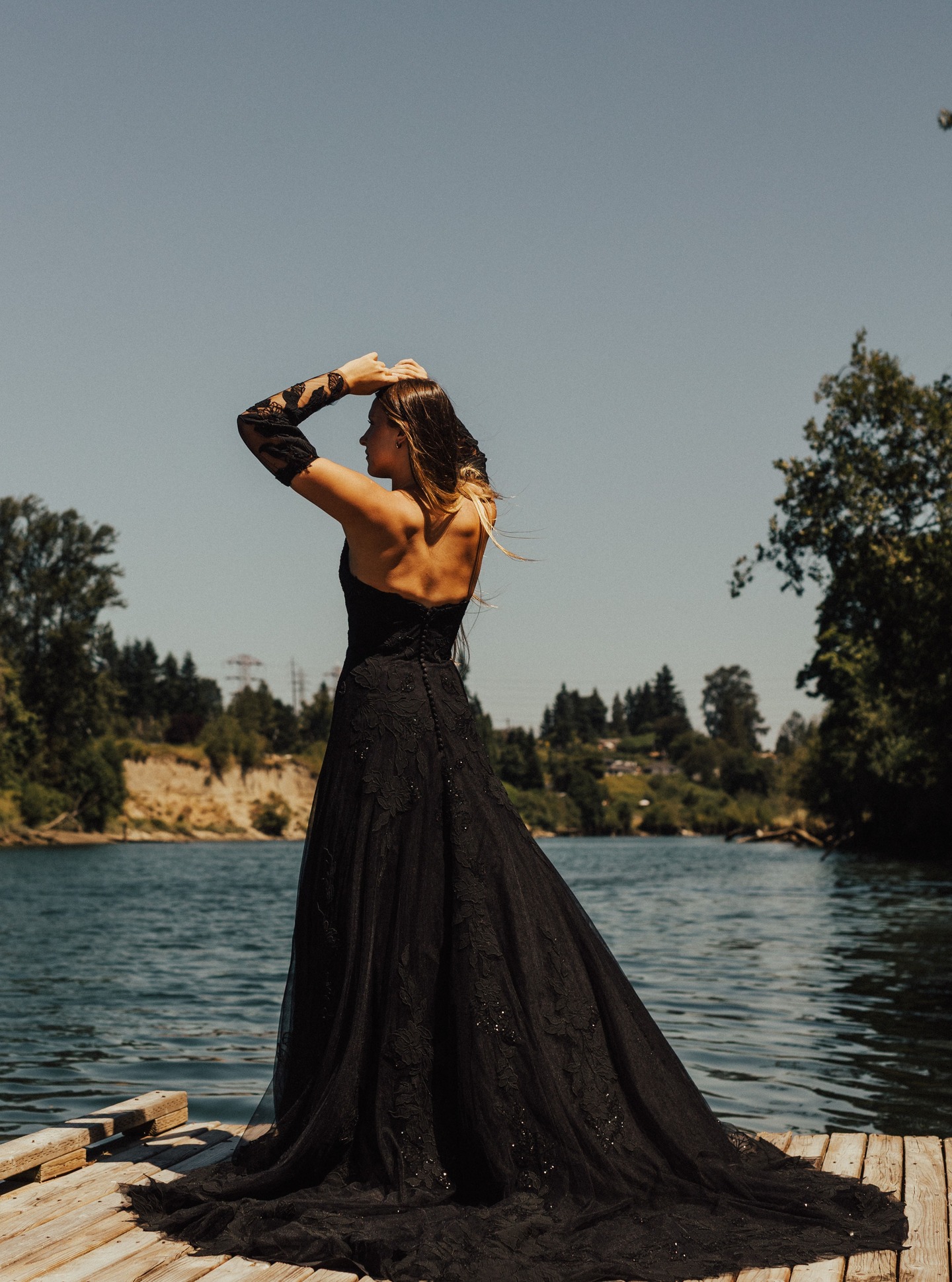 A black lace wedding dress made for the modern bride. Embracing a non-traditional, vamp romantic bridal look with a sculpted corset back, sheer bodice, and a flowing dramatic train. A perfect blend of elegance and dark romance that is bold, yet timeless.
#fortheluv #luvey #blackweddingdress #modernbride