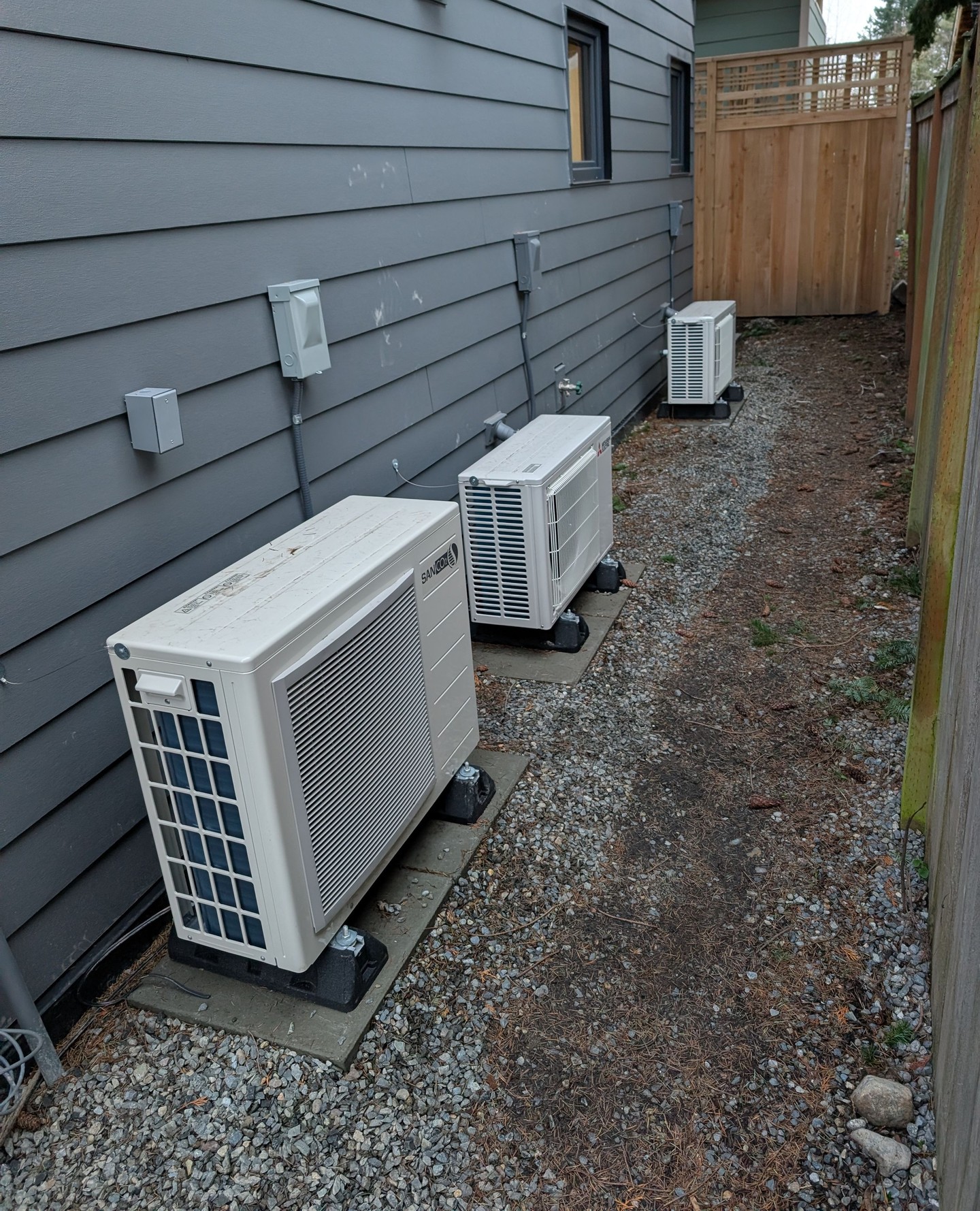 Compressor alley!! The DADU is using 3 heat pumps, two for heating/cooling, one for hot water. We have two 1:1 Mitsubishi systems (ducted top floor, ductless bottom floor) and a SanCO2 split system heat pump water heater.
The SanCO2 system is a fantastic but expensive unit. Hyper efficient, silent, but the key for this project is that the 43gal tank (at 145 degrees F) is small and can be tucked around the corner under the stairs, freeing up valuable storage space.
#DADU #ADU #backyardcottage #greenbuilding #buildingscience #sustainablebuilding #highperformancebuilding #highperformancehomes