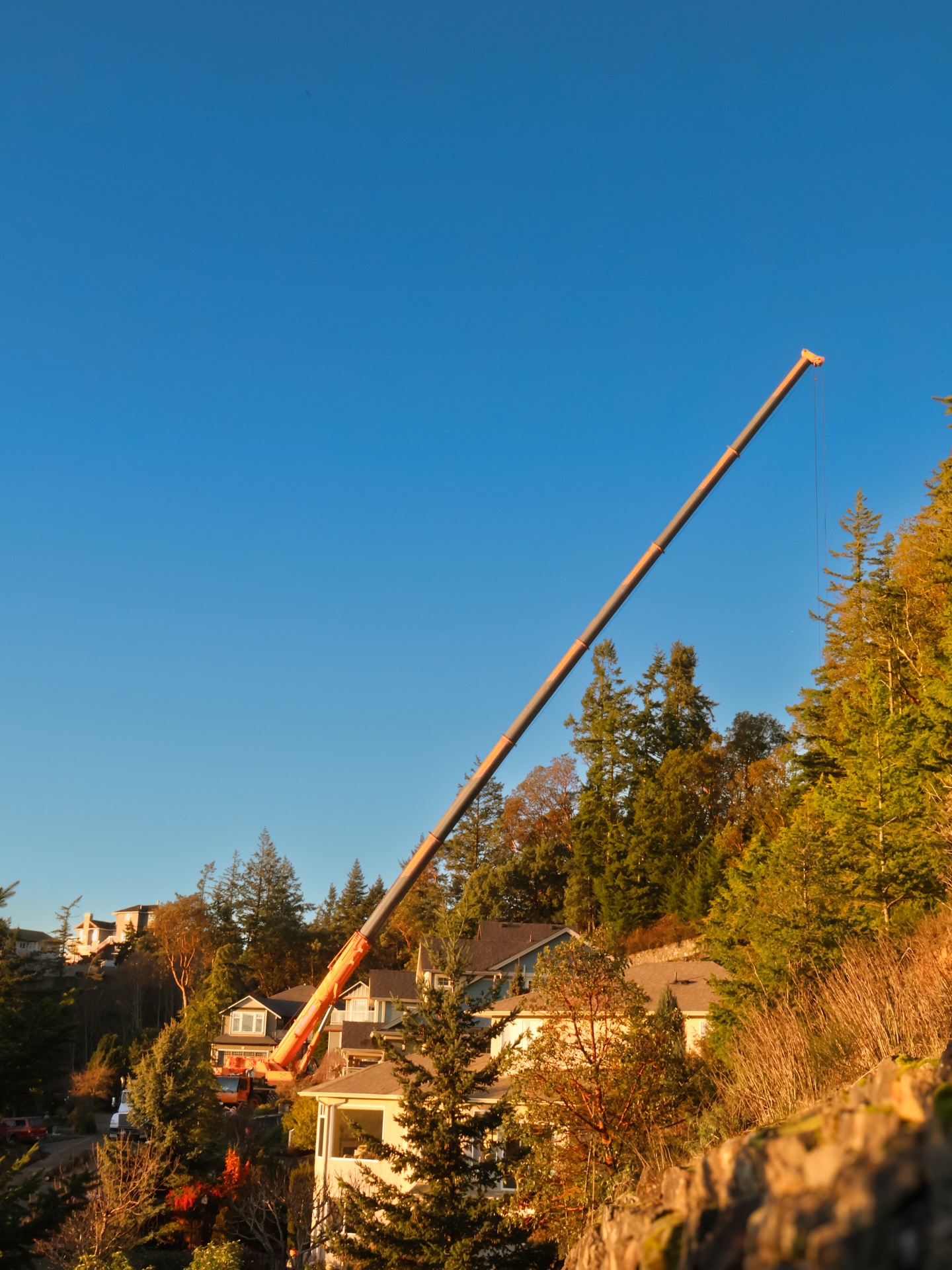 Recently on Sun Estates:
Clearing boulders that slid down the embankment toward multiple homes. It could have been much worse, thankfully for the trees on the slope that stopped more rocks from coming down and causing further damage.
