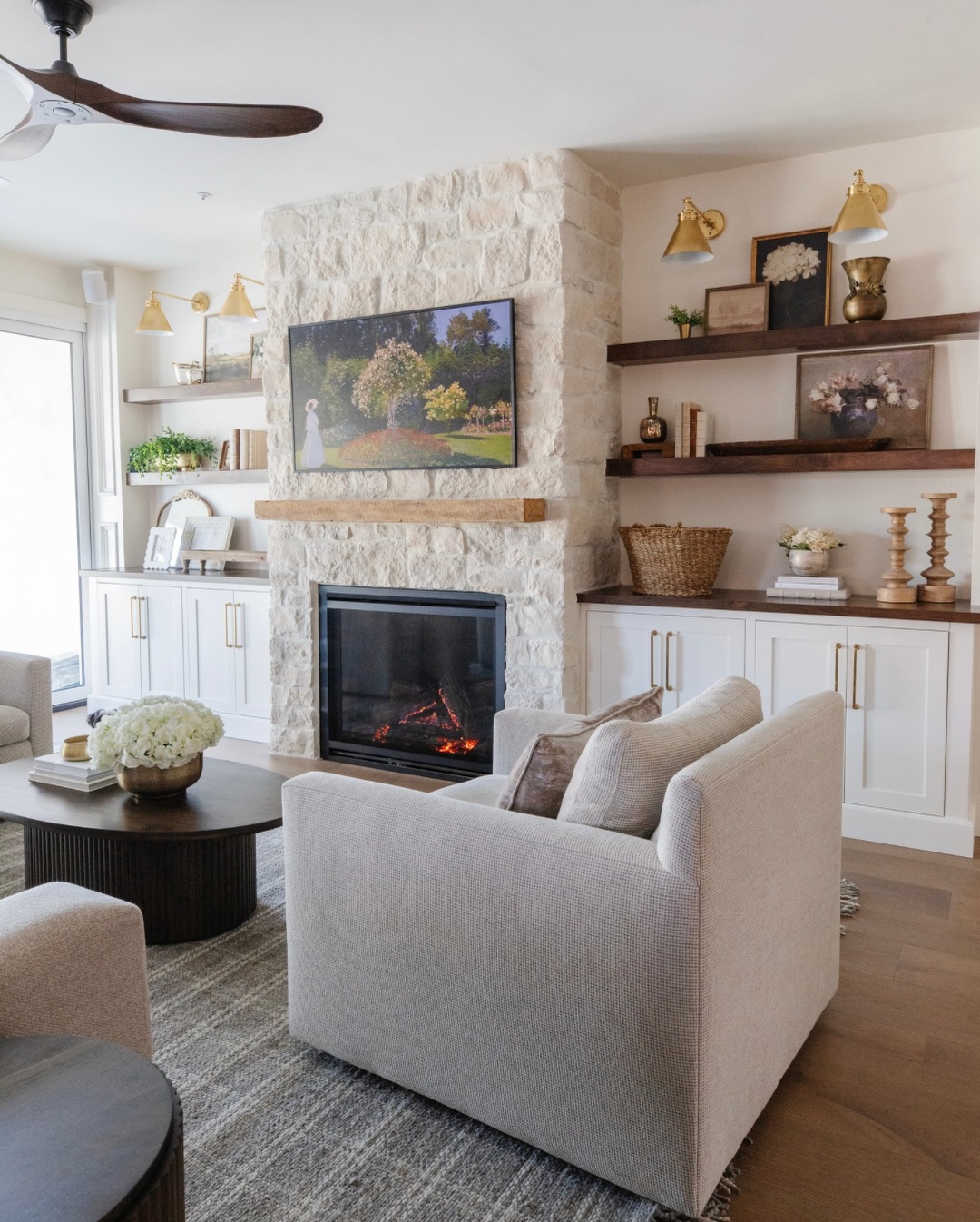 Swipe for the BEFORE 💫
We are absolutely obsessed with this cozy, European-cottage-inspired living room transformation!✨
We completely reimagined the layout of this space to create a spacious kitchen with an open concept flowing seamlessly into the living room.
This inviting space makes me want to cozy up and watch a movie with friends and family. Our client wanted her home to evoke memories of her grandma’s house on the East Coast, with timeless and vintage features and details. We will never get over the stone accents, stunning vintage accessories, and the overall cozy and inviting vibe of this home.🤍
Tell us, What is your favorite feature in this living room?✨