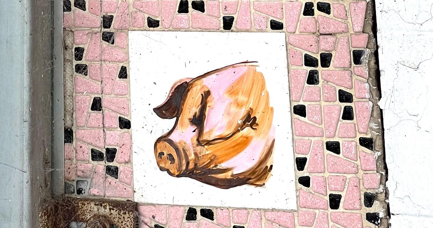 Pictorial postwar glazed butcher tile