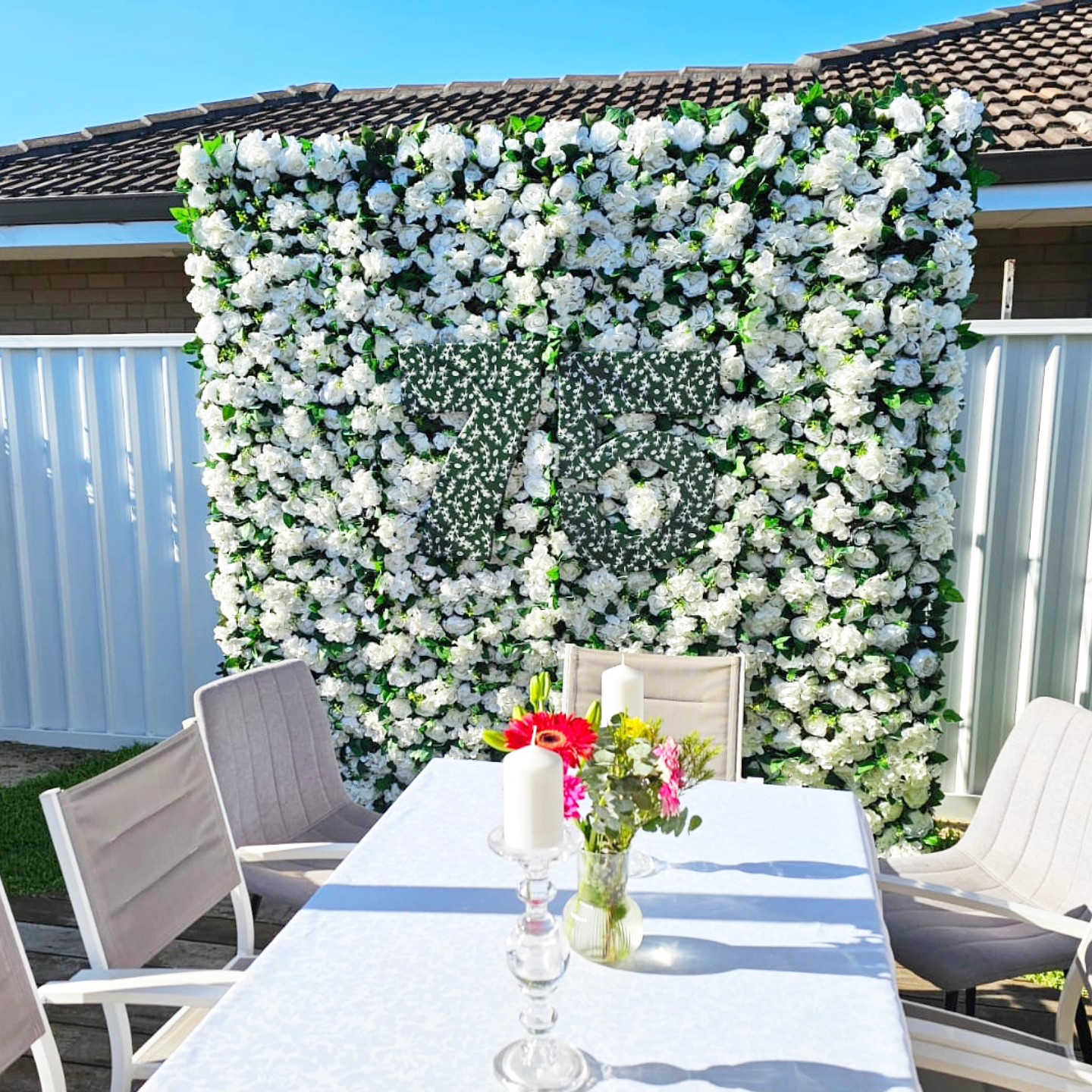 Transforming moments into memories with our exquisite Joy Flower Wall setup, creating a vibrant backdrop for a special 75th birthday celebration! 🌺🎂 #FloralElegance #FlowerWallHirePerth