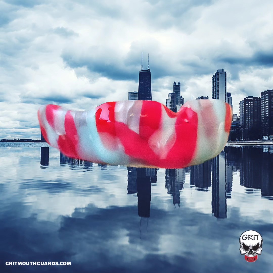 Chicago-inspired custom mouthguard, with a light blue, silver, and red camouflage design. #chicago #camo #gritmouthguards #mouthguards #custommouthguard www.gritmouthguards.com