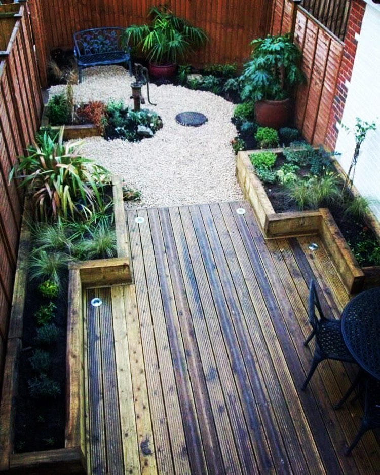 Natural look decking - gravel seating - raised timber beds #solebay #landscaping #design #southwold #suffolk