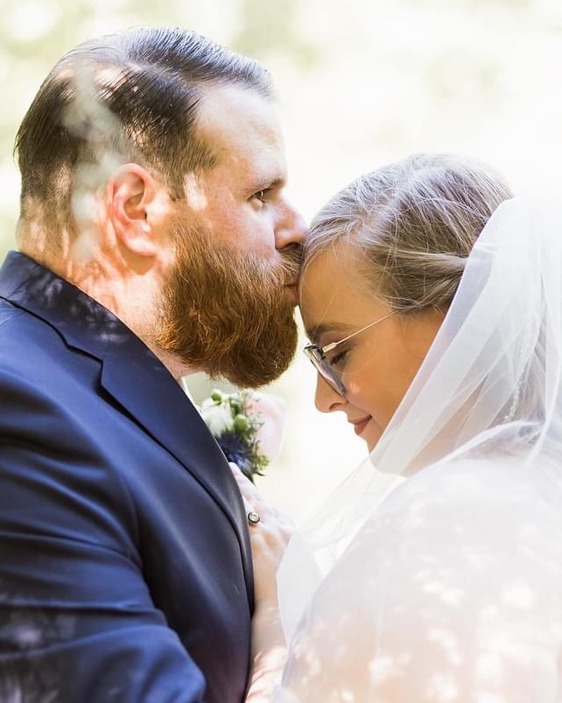 Kisses captured in Savannah, Georgia! Schedule a call with Pour Vous for all your wedding needs and services.