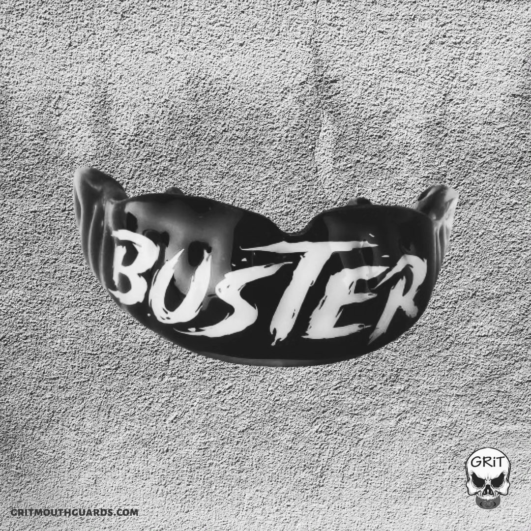 Solid black custom mouthguard with Buster written across the front in white grunge-like font. www.gritmouthguards.com
#gritmouthguards #mouthguards #buster #mma #custommouthguard #grunge