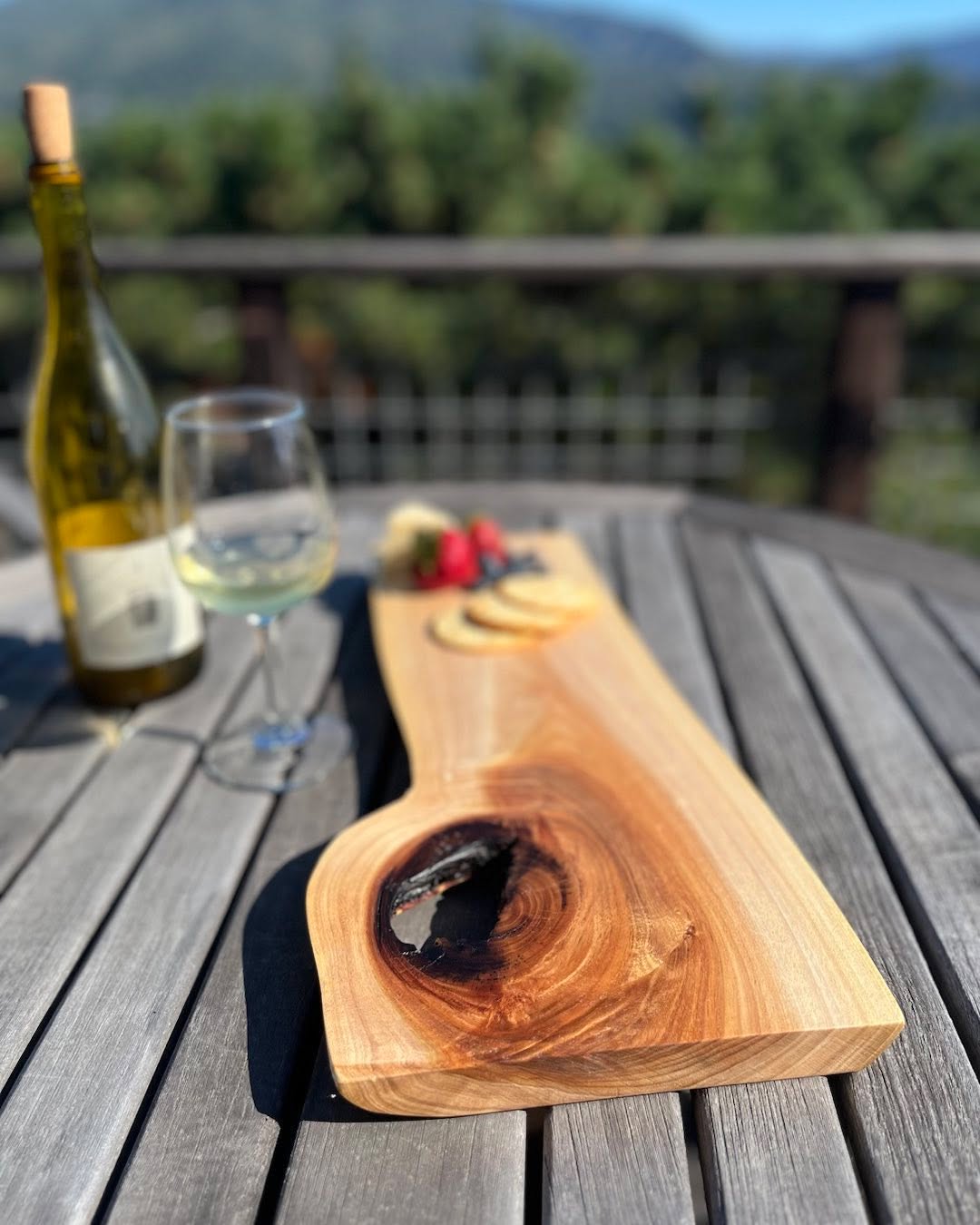 Live edge black acacia charcuterie board.