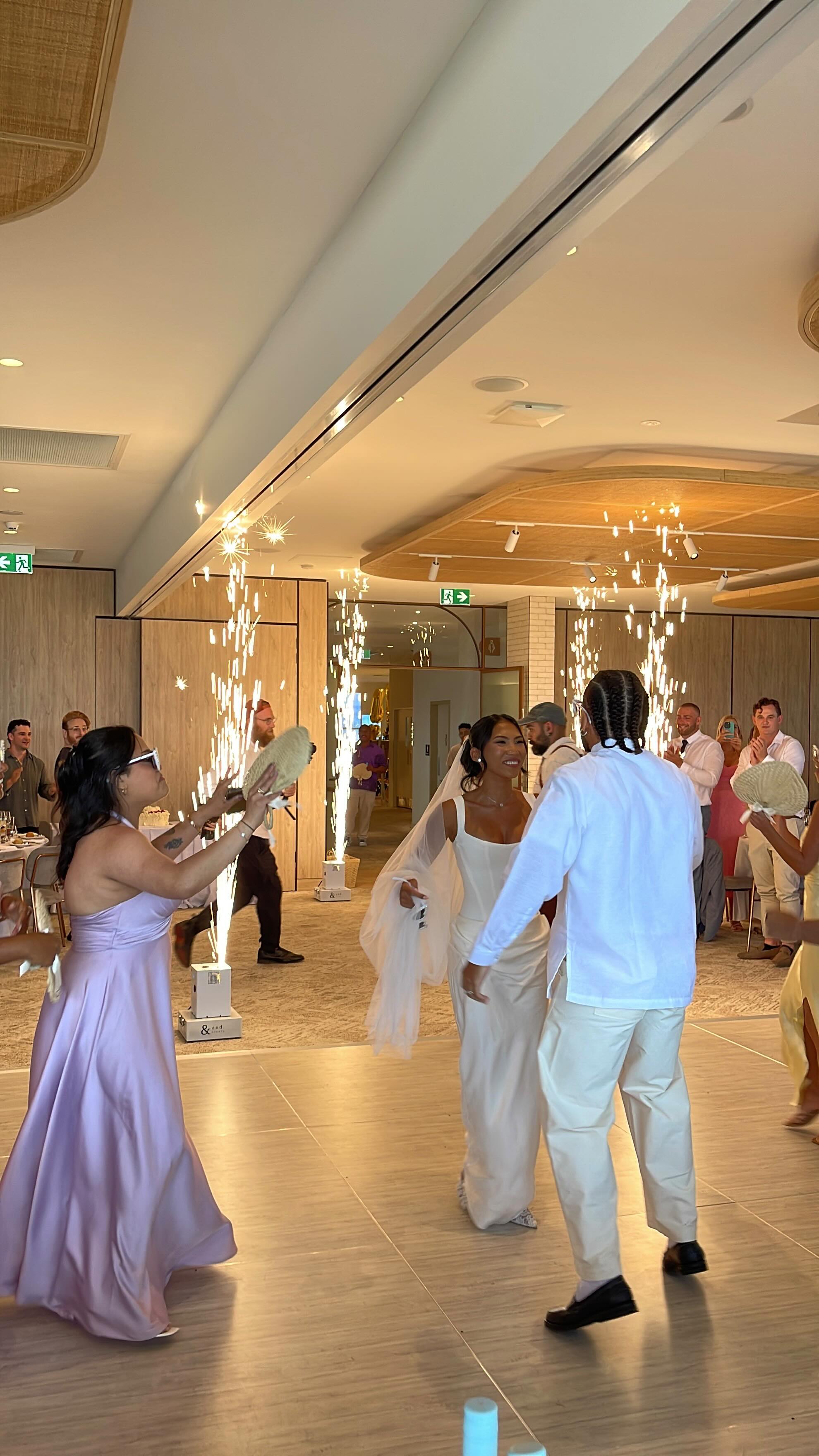 An entrance made of light.
Four sparks. One unforgettable beginning.
Nathaniel & Rizzy’s Sydney wedding ✨
#SydneyWedding #LuxuryWeddingSydney #WeddingEntrance #ModernWedding