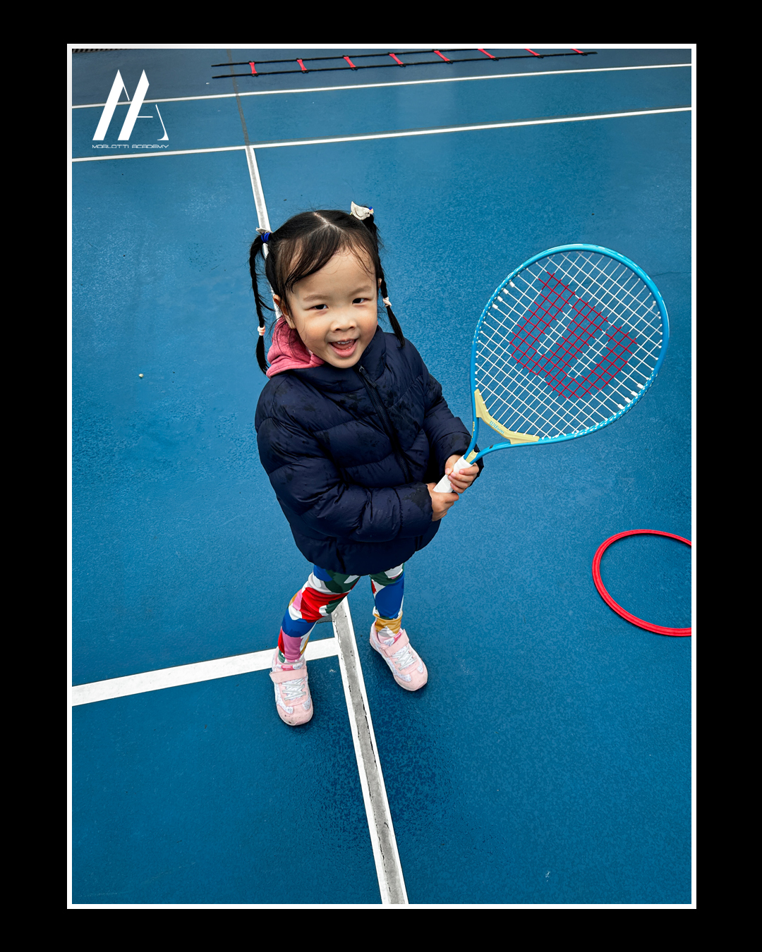Smiles, racquet in hand, and ready to play 🎾😊 Our Red Ball Mini Champ in action
