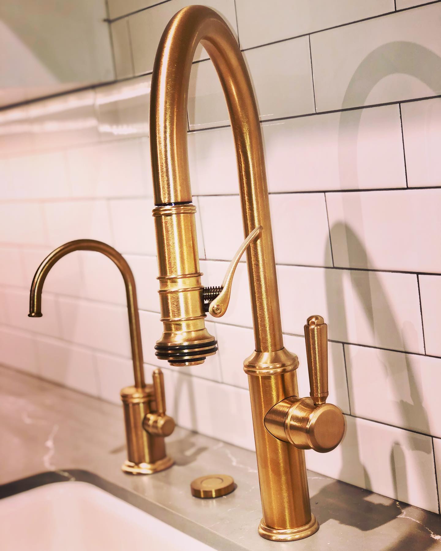Classic design with an industrial edge, the Davoli faucet by @calfaucets. On display in satin bronze in our Oakland showroom.