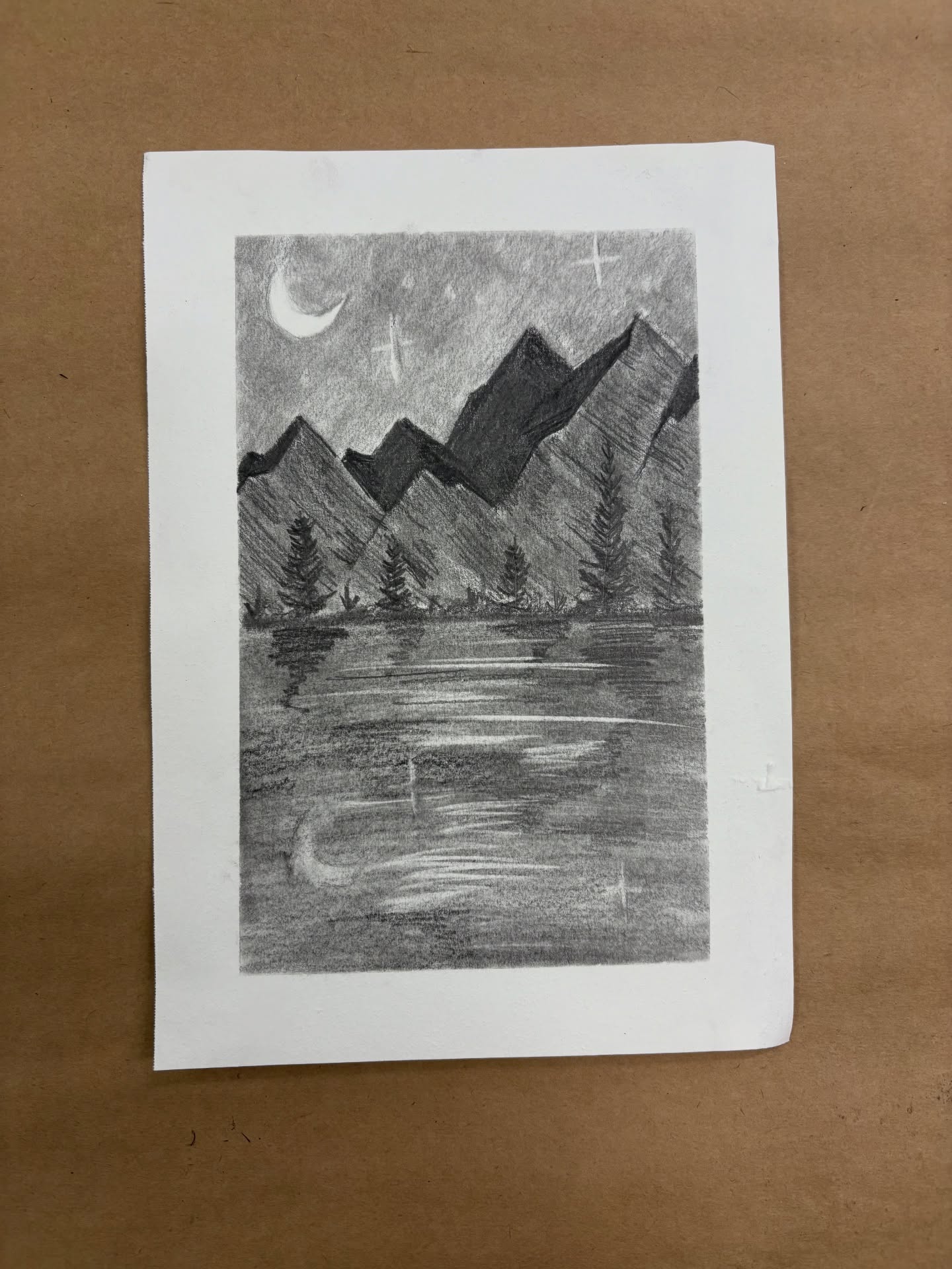 In our adult class we learned about values and then learned how to do a mountain landscape using graphite pencils and blending stubs! The class did an amazing job!